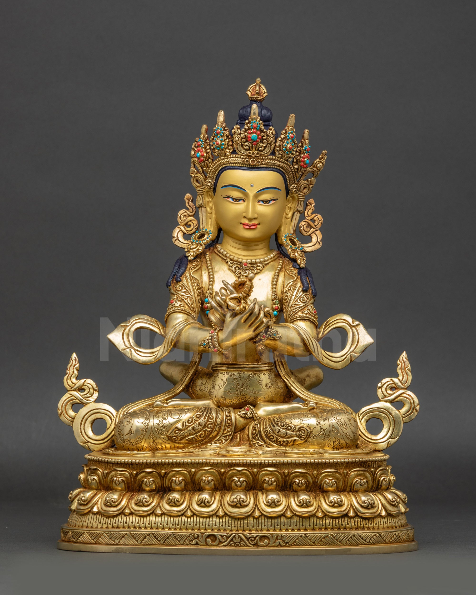 regular close up Vajradhara statue showing gold fire-gilded details