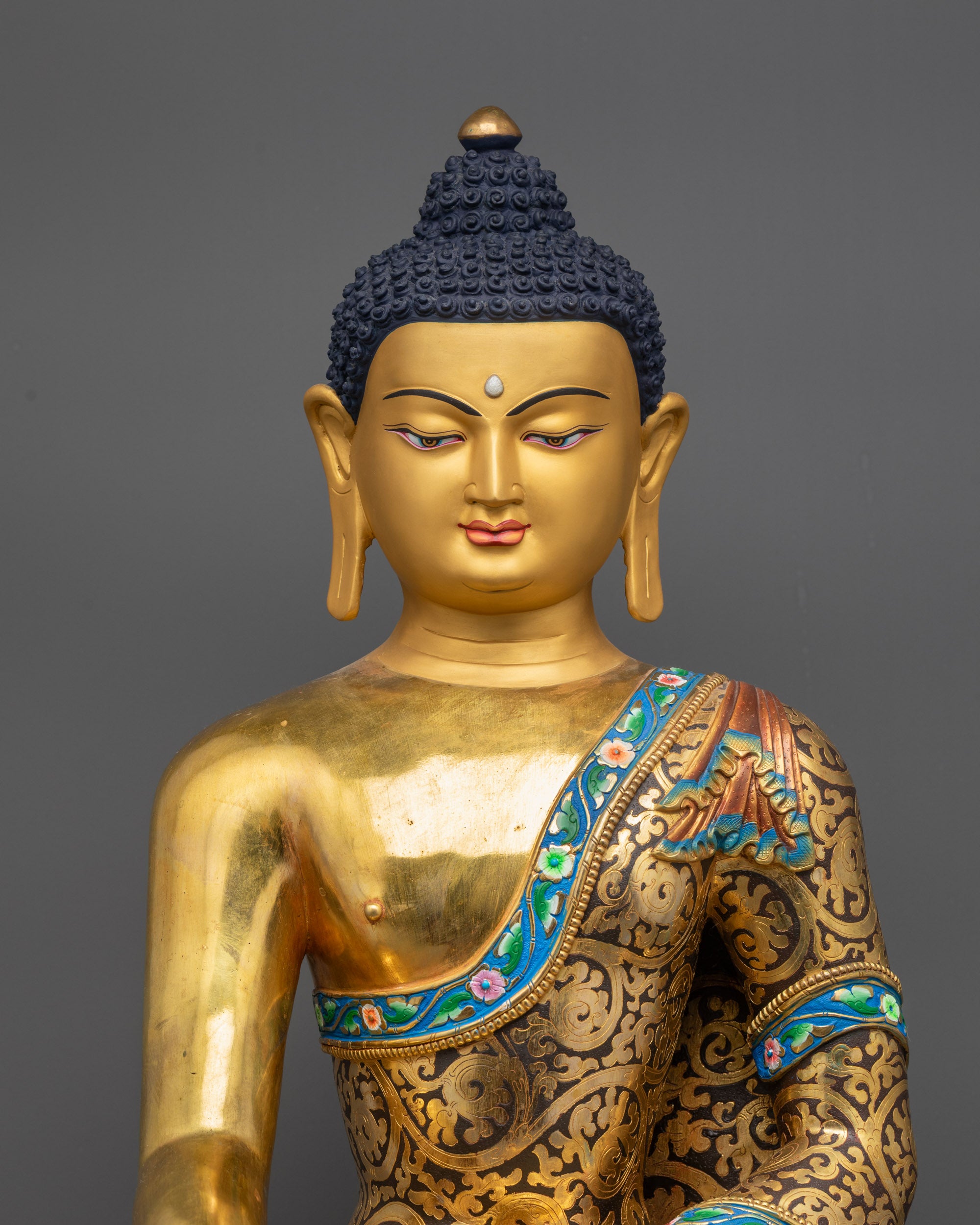 regular close up of Shakyamuni Buddha robe with floral motifs and fine carvings