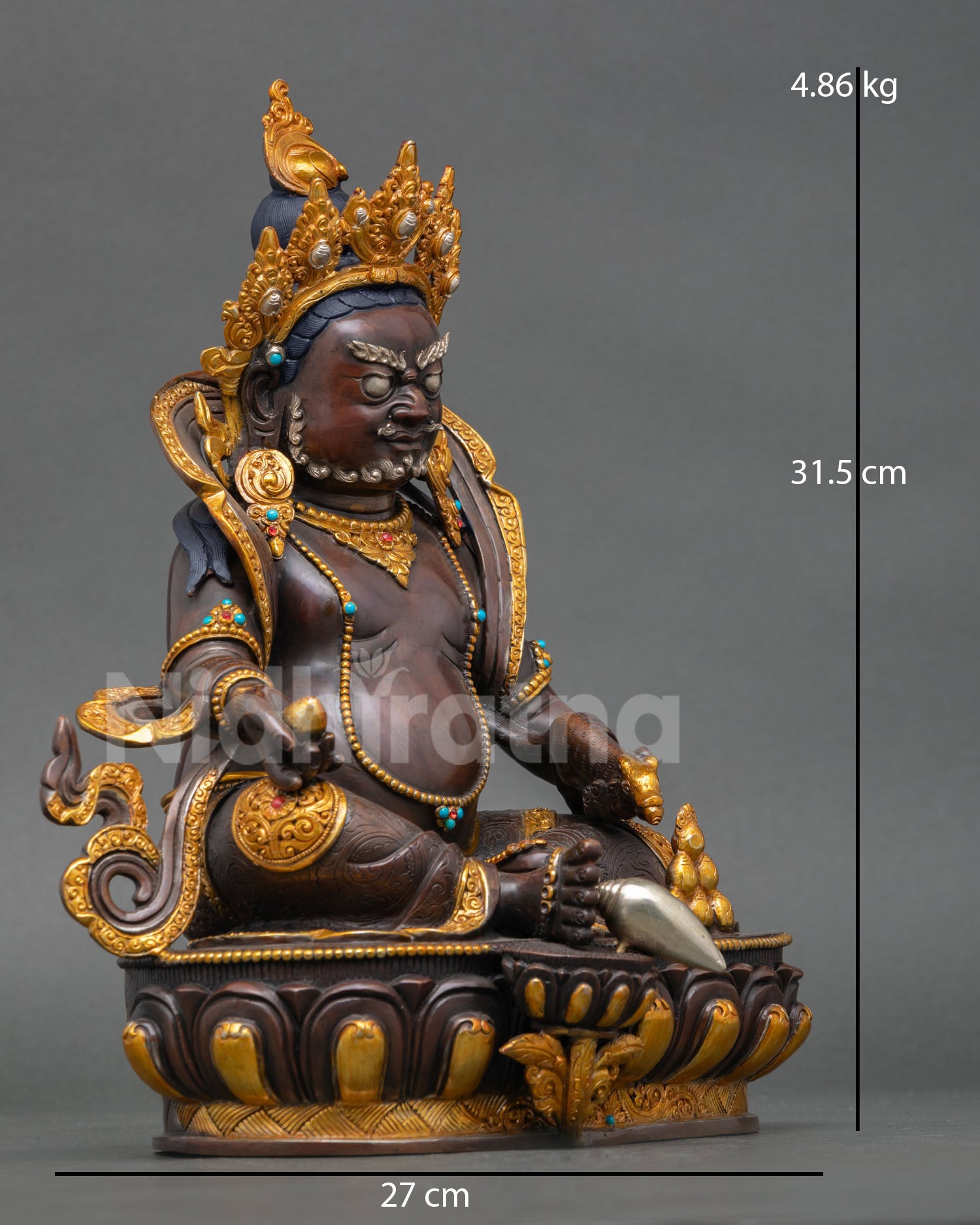 Right profile Dzambhala statue Himalayan sculpture holding mongoose and wish fulfilling jewel