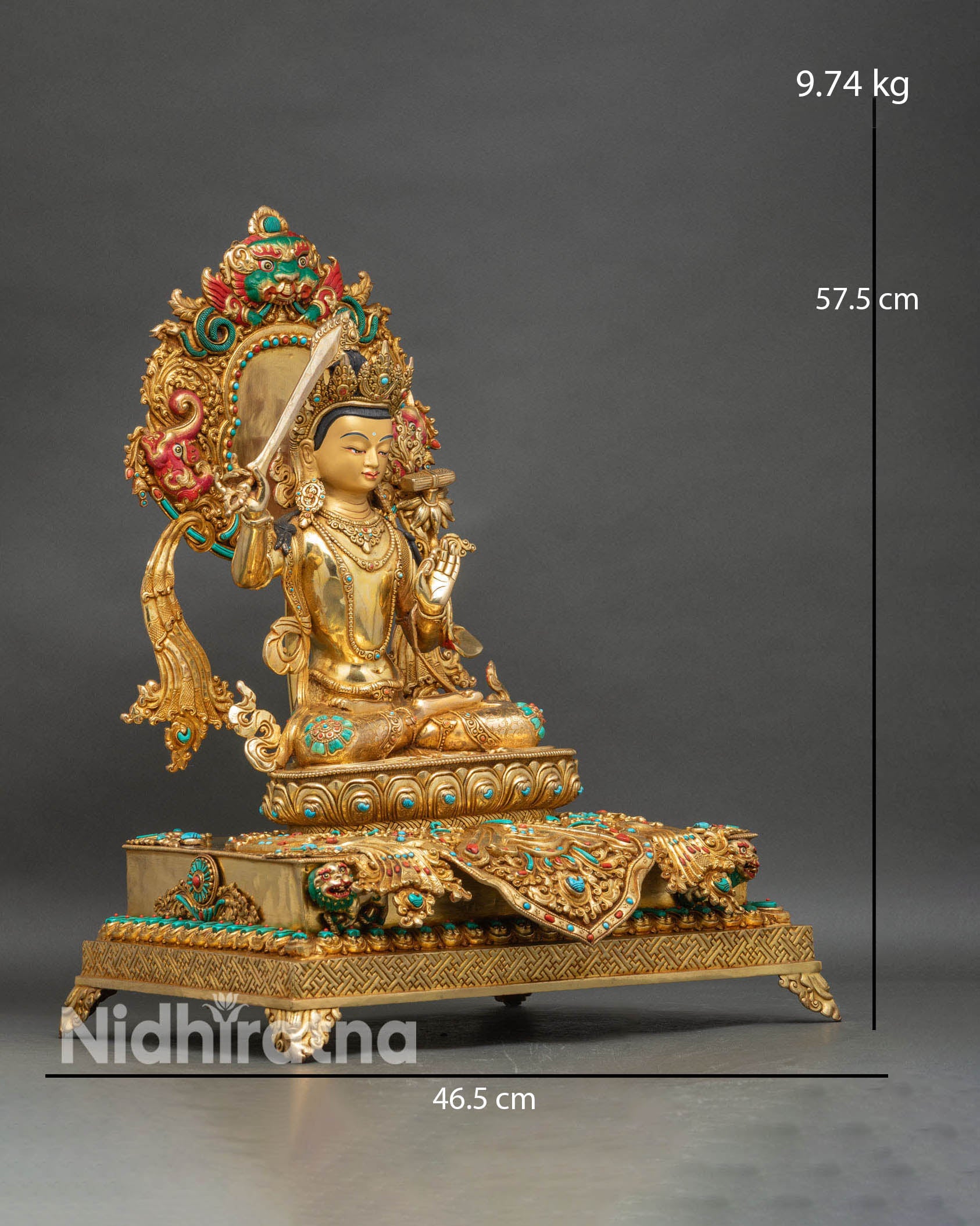 right profile of manjushri statue on royal throne with semi-precious stone inlays