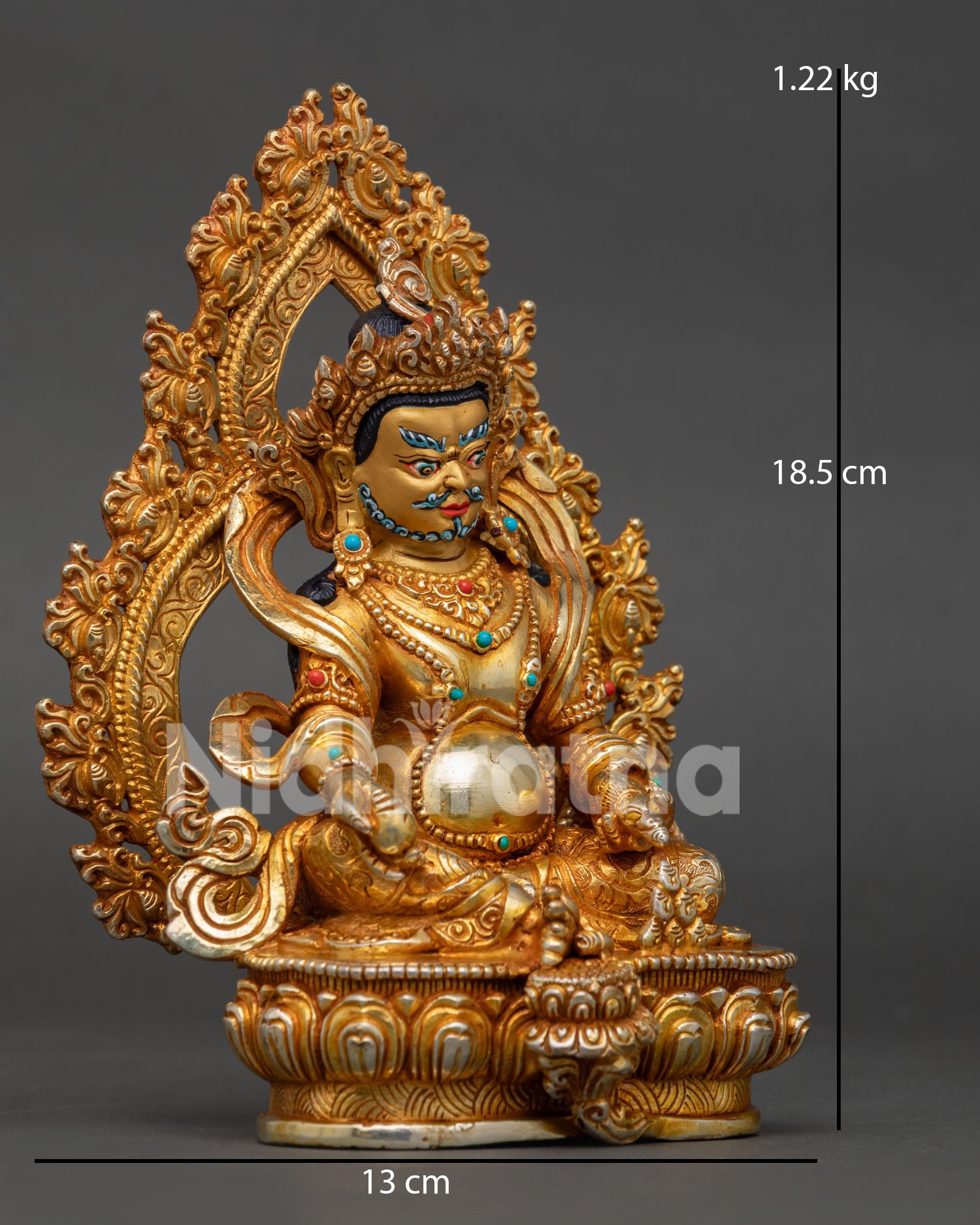 Right profile of Dzambhala Buddhist statue with intricate Himalayan craftsmanship