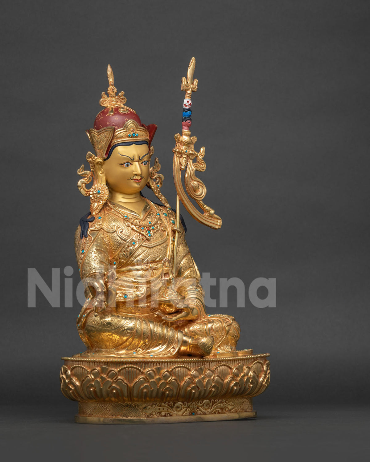Right side profile view of handcrafted copper Guru Rinpoche statue