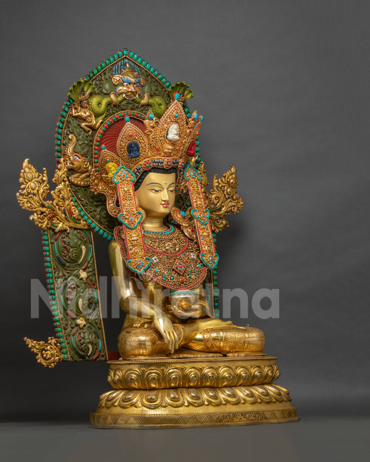 Right side view of Jowo Shakyamuni Rinpoche statue with lotus throne base