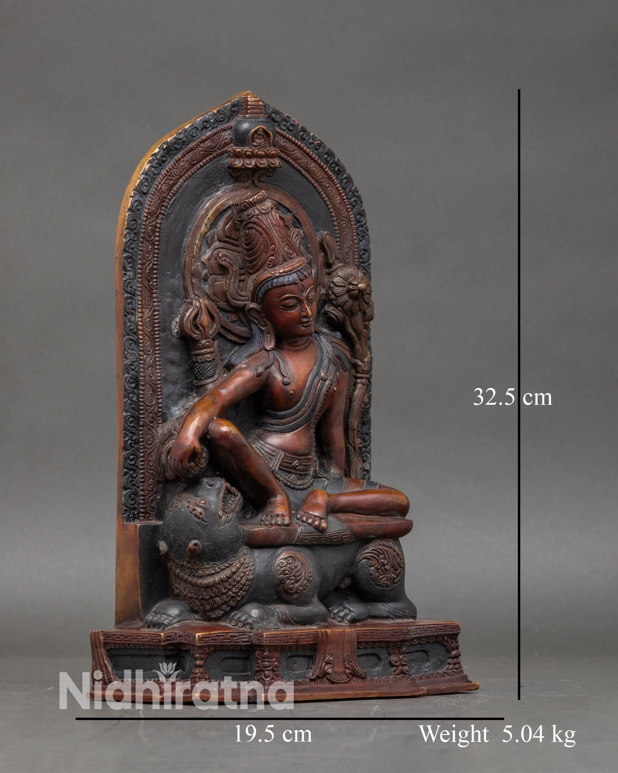Right side view of Lokeshwor statue seated on snow lion with arched prabhavali