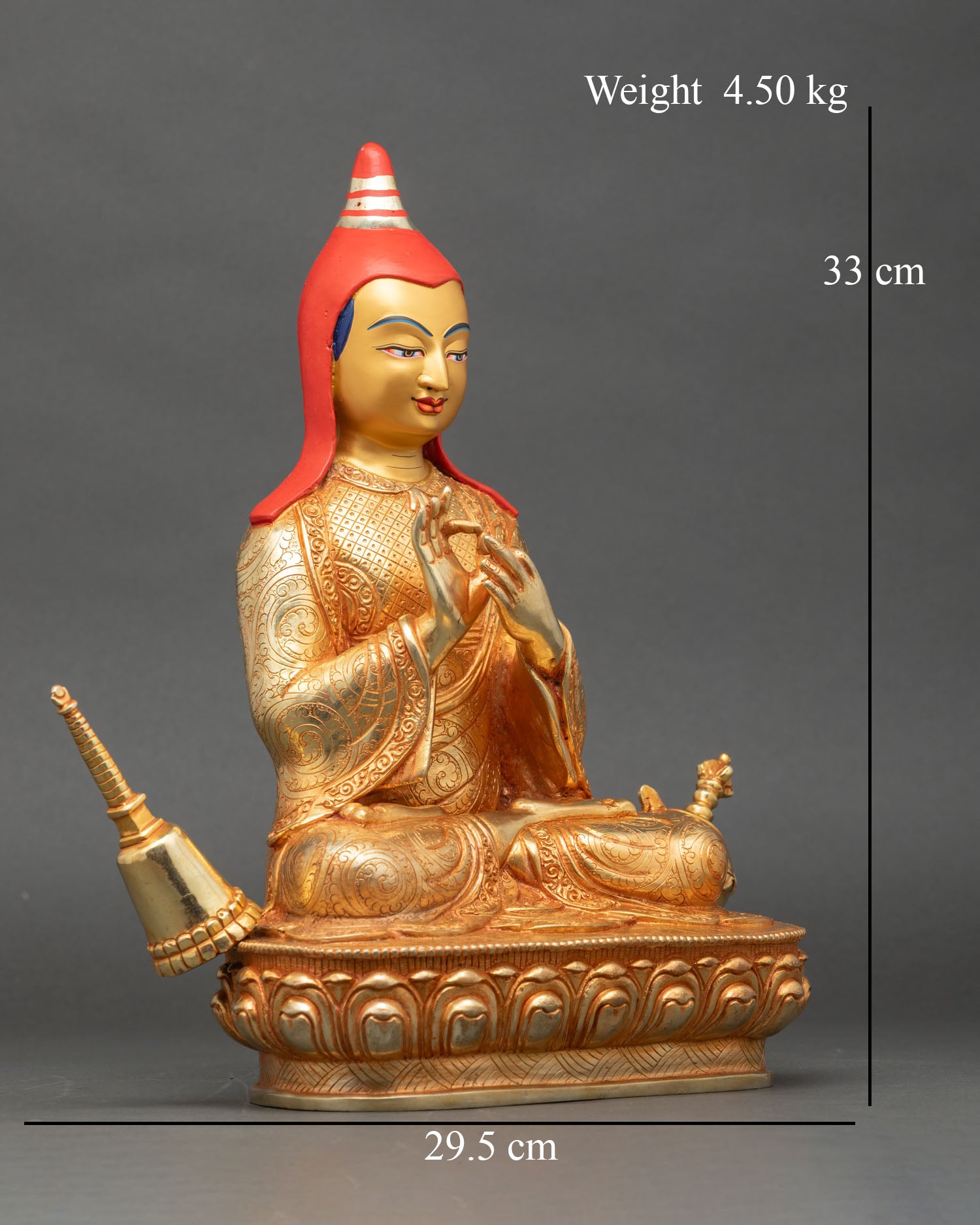 Right side view of Atisha Dipankara statue with ritual vase and stupa symbols