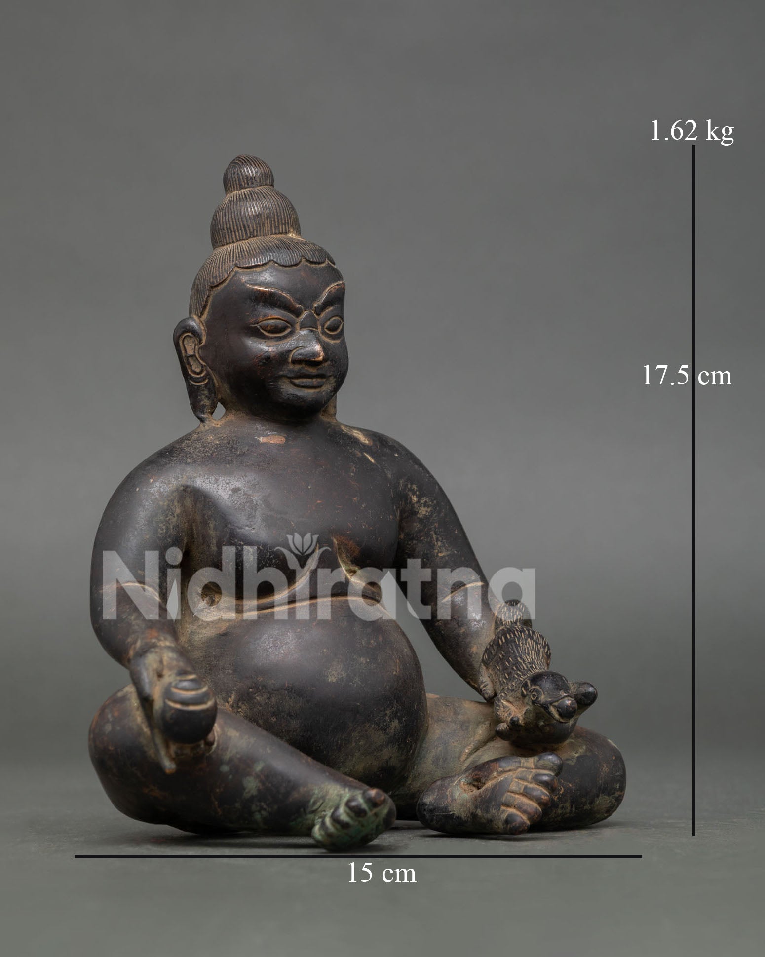 right side view of authentic oxidized copper dzambhala statue handcrafted in nepal