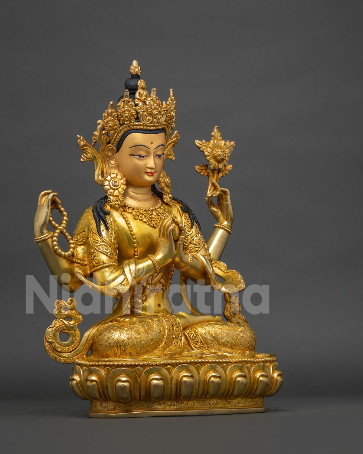 Right side view of Chenrezig statue, handcrafted Nepali Buddhist art