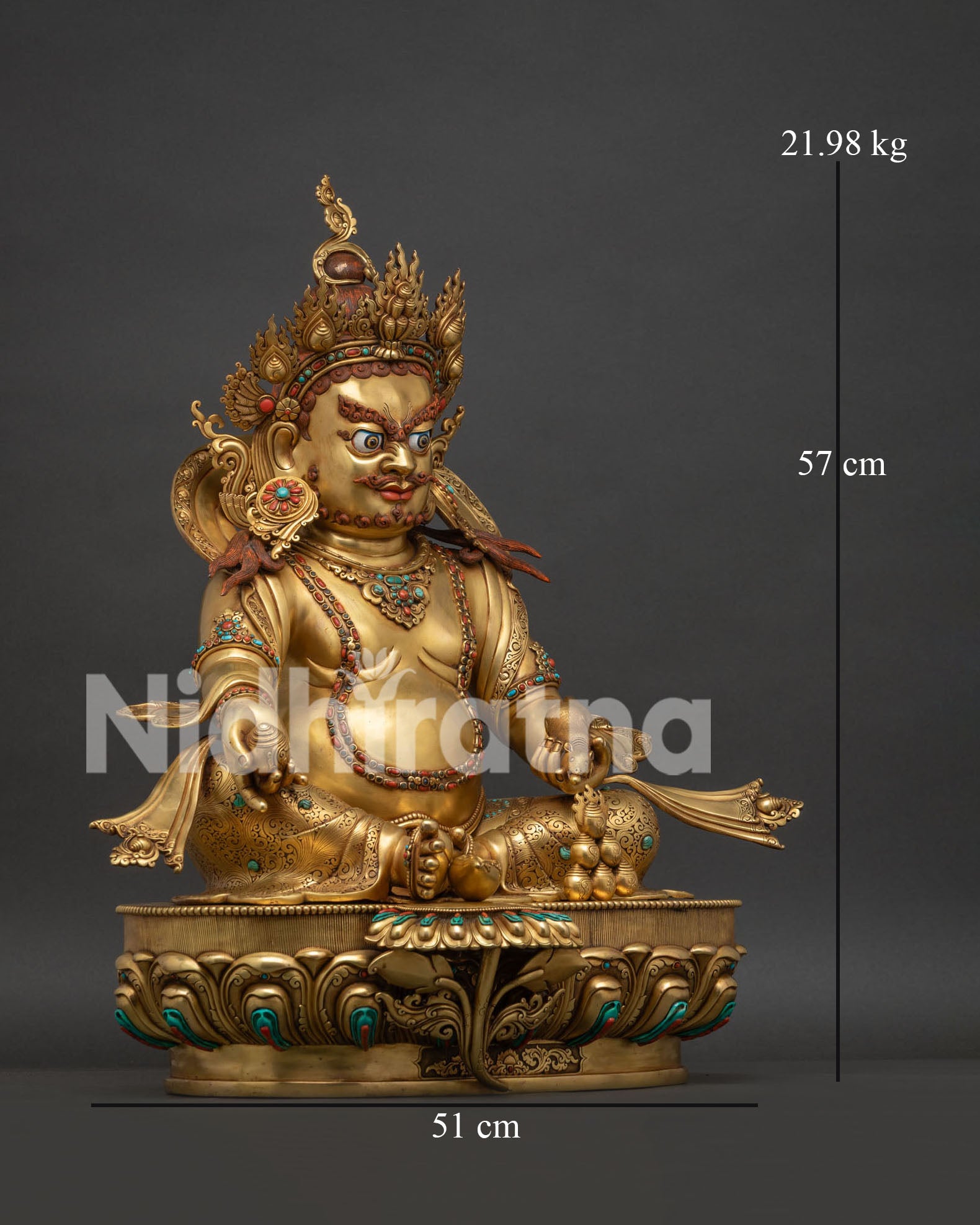 Right side view of Dzambhala statue holding Chintamani jewel on lotus pedestal.