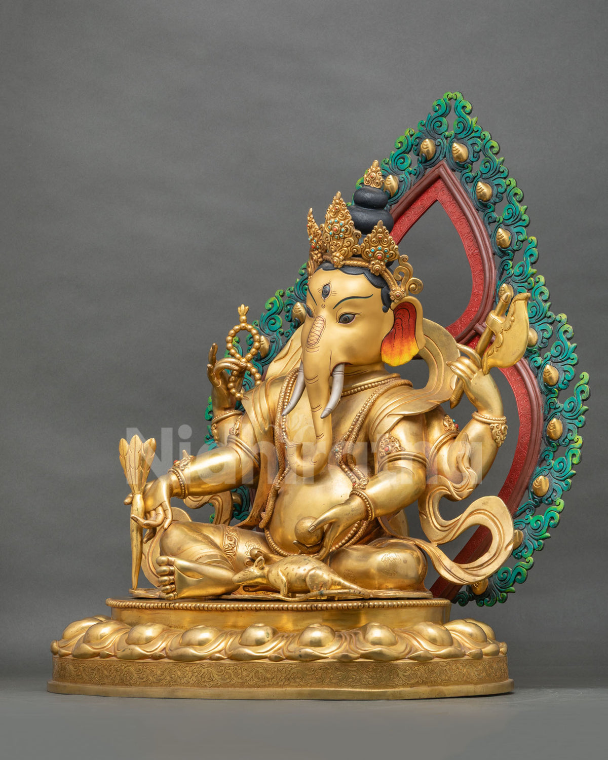 Right side view of Ganesh sculpture with Mushika, rosary and axe, handcrafted copper art from Nepal