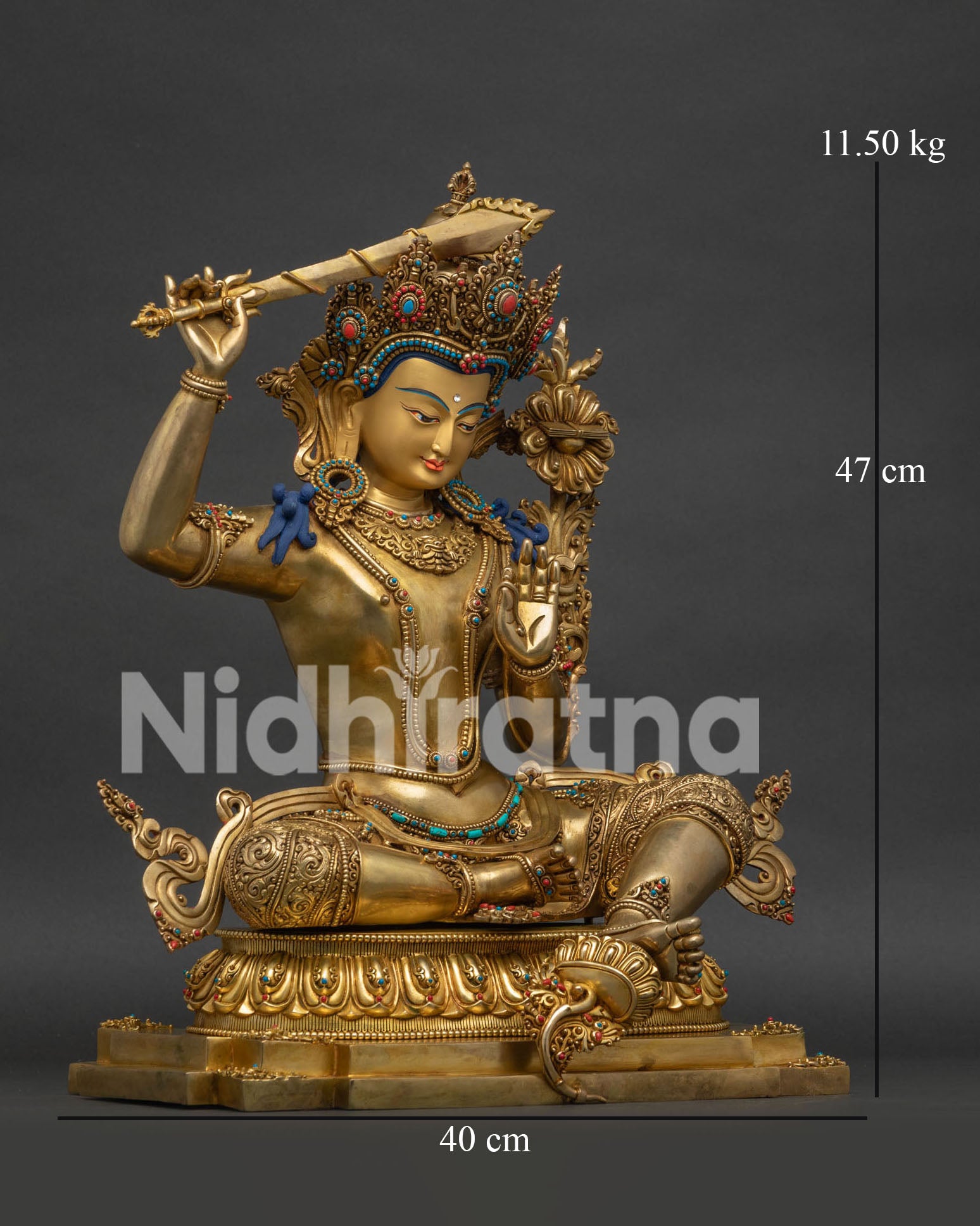 Right side view of gold-gilded Manjushri statue, handmade in Nepal