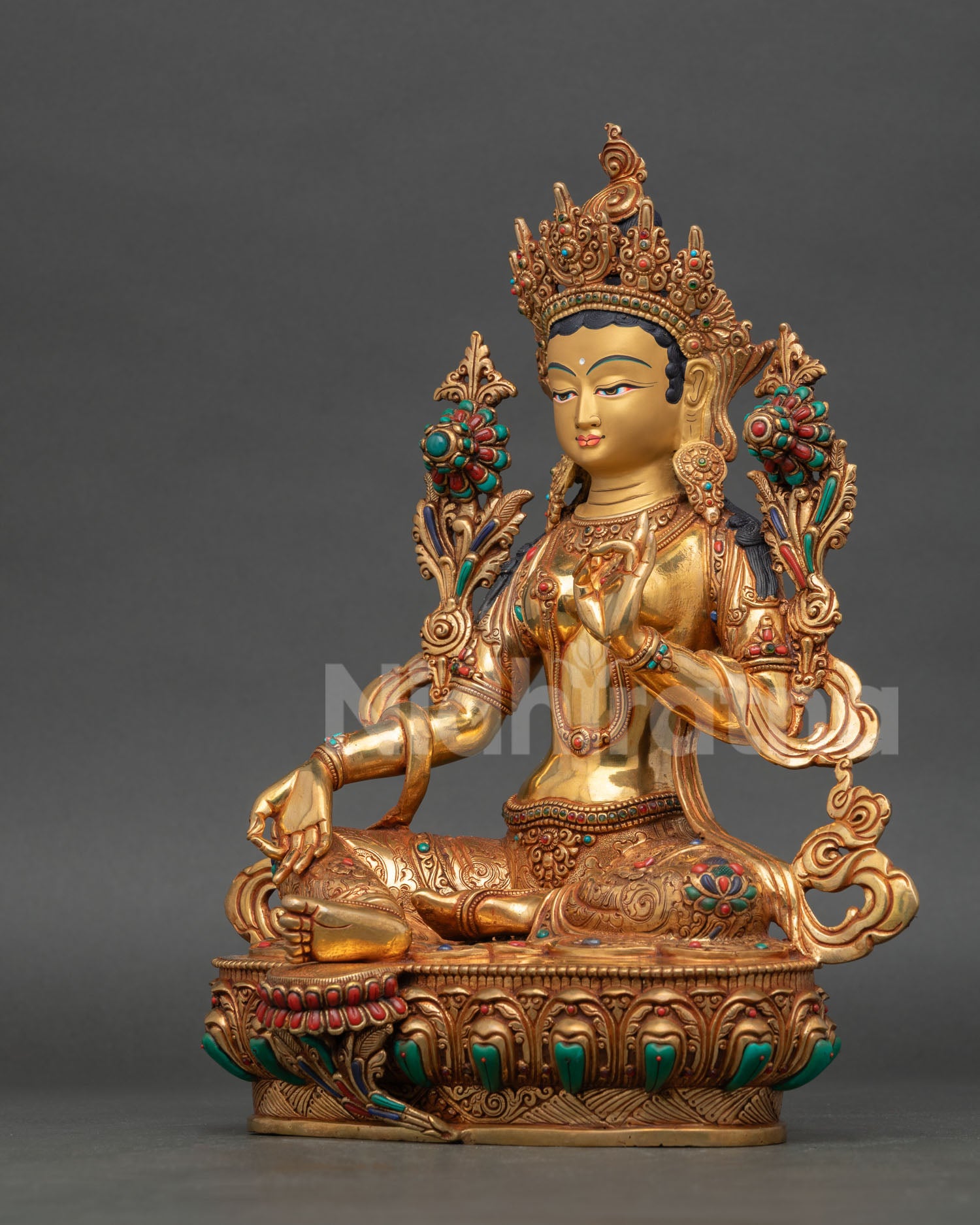 Right side view of Green Tara sculpture, showing detailed copper craftsmanship, gold gilded finish, and sacred Nepalese Newari artisan artwork