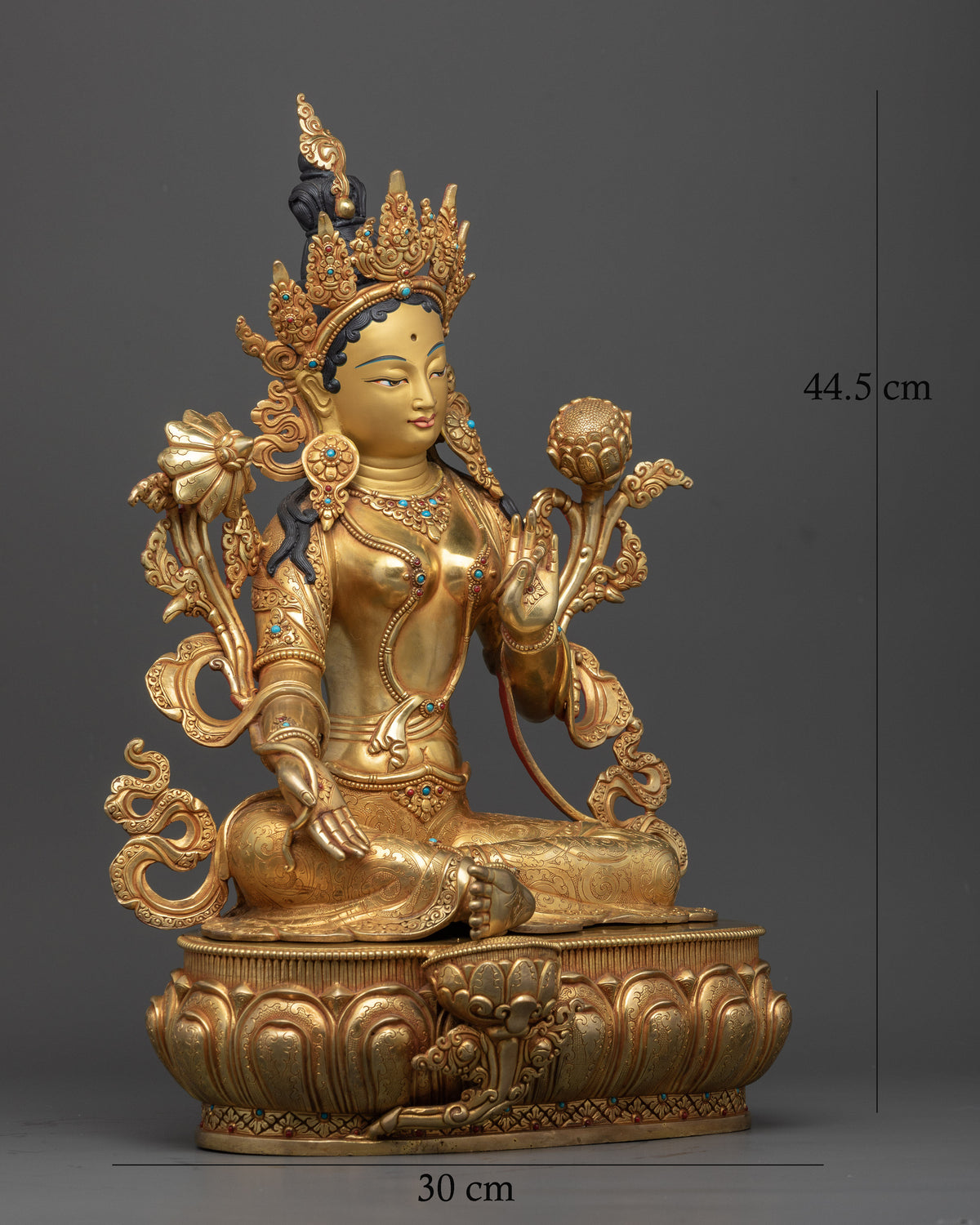 Right side view of Green Tara Statue seated in lalitasana on a lotus throne