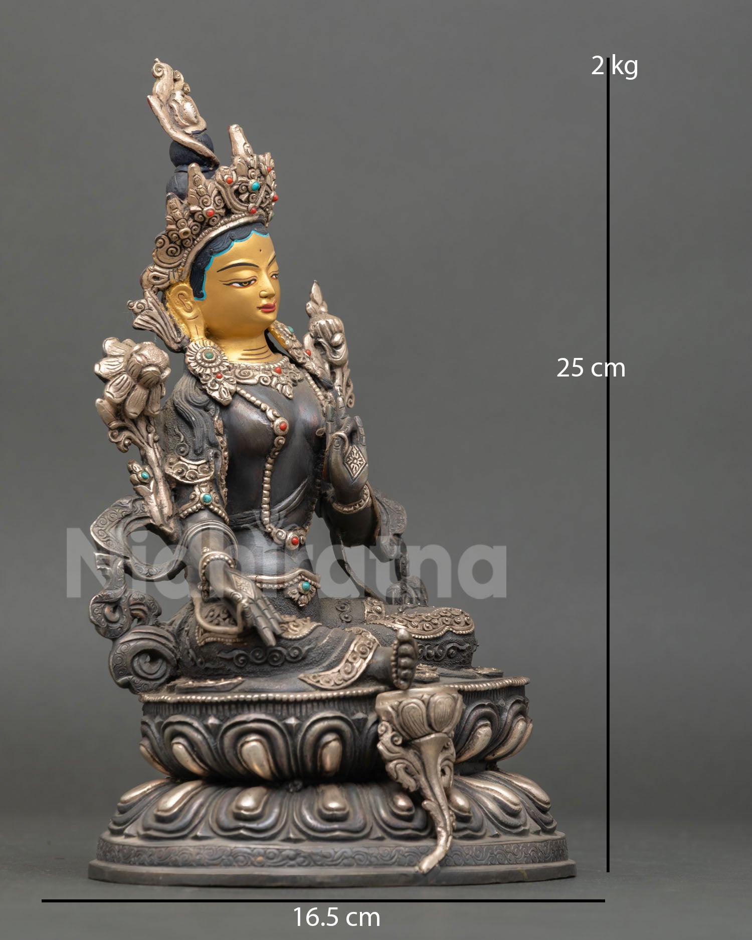 right side view of green tara statue with abhaya mudra and lotus throne