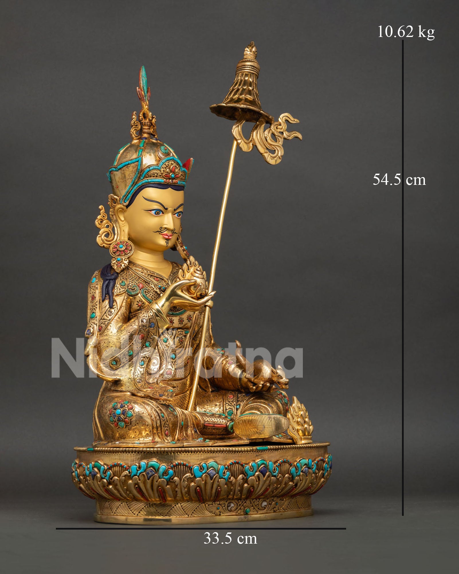 right side view of guru orgyen norlha statue, nepalese handmade copper sculpture with lotus throne