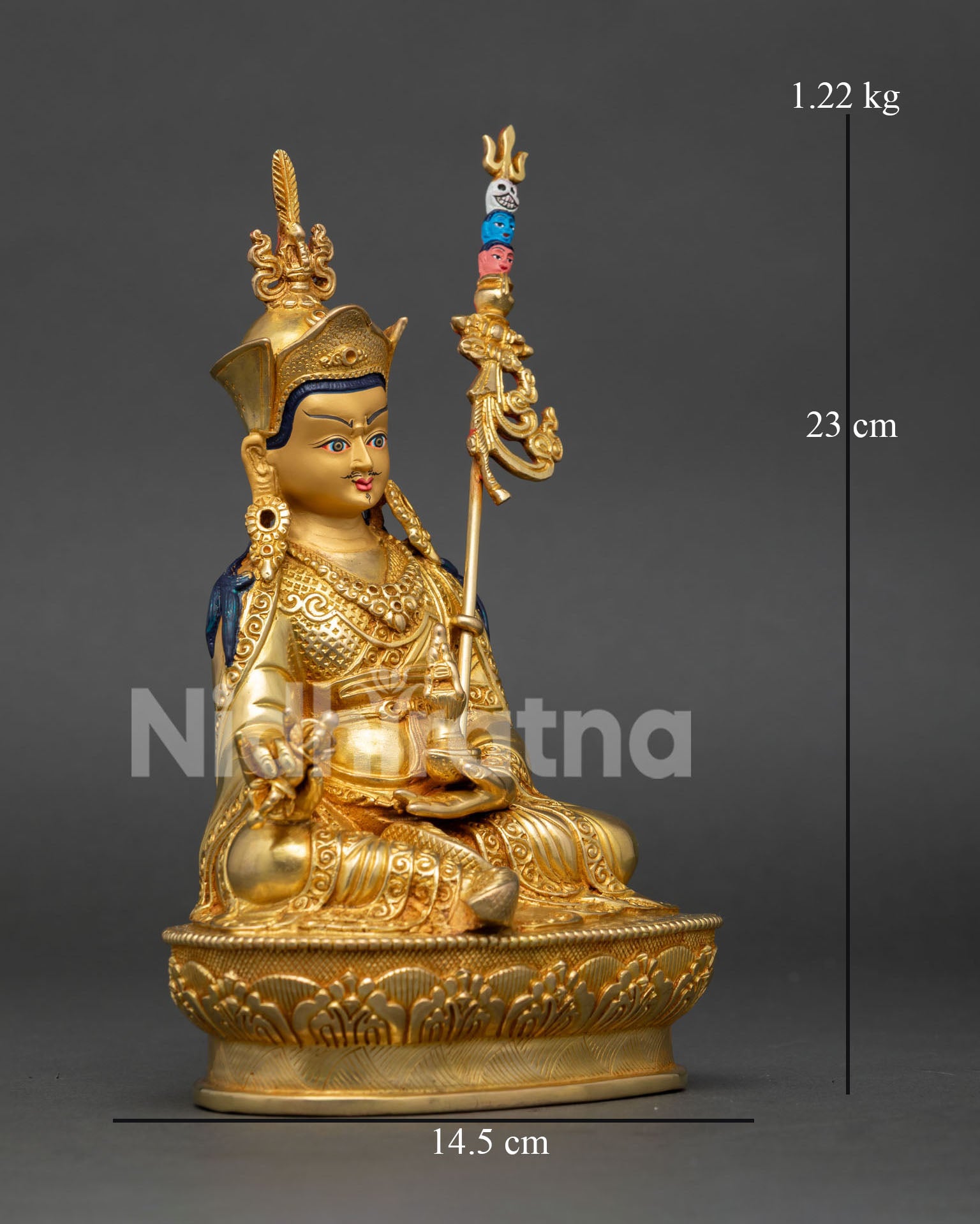 Right side view of Guru Rinpoche statue with lotus throne and Buddhist symbolic details