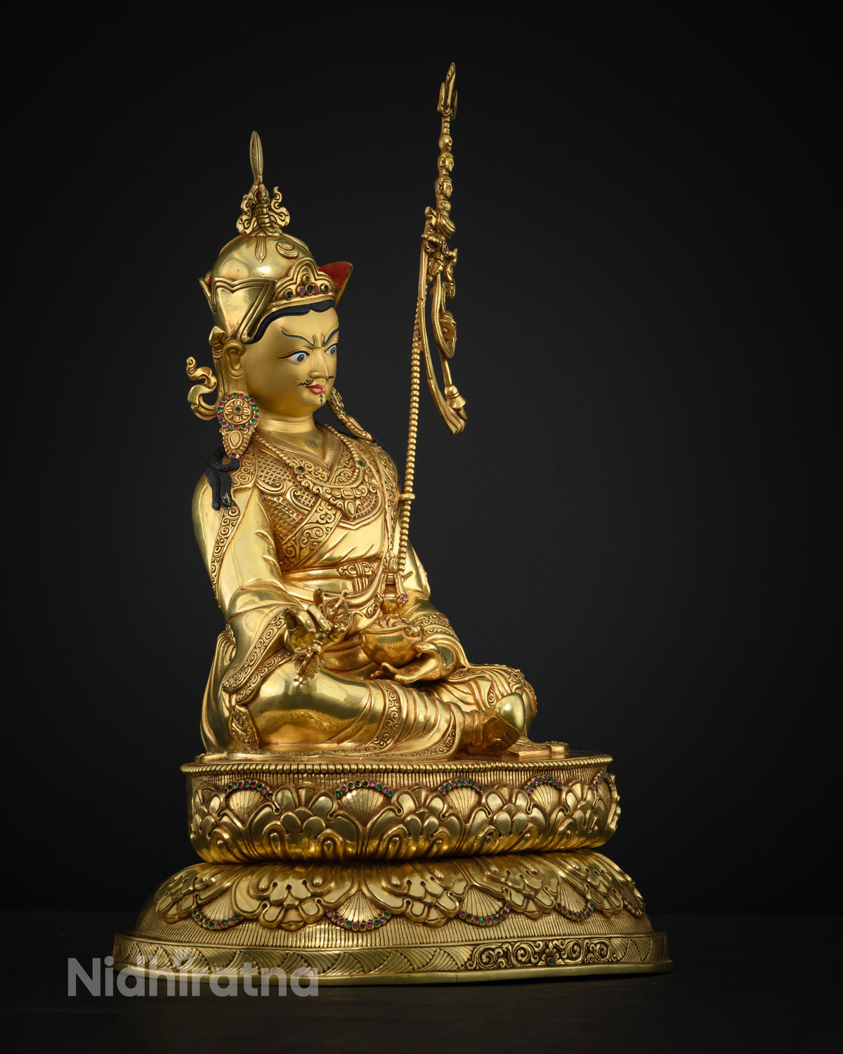Right side view of Guru Rinpoche Vajrayana statue with lotus pedestal and 24K gold gilding
