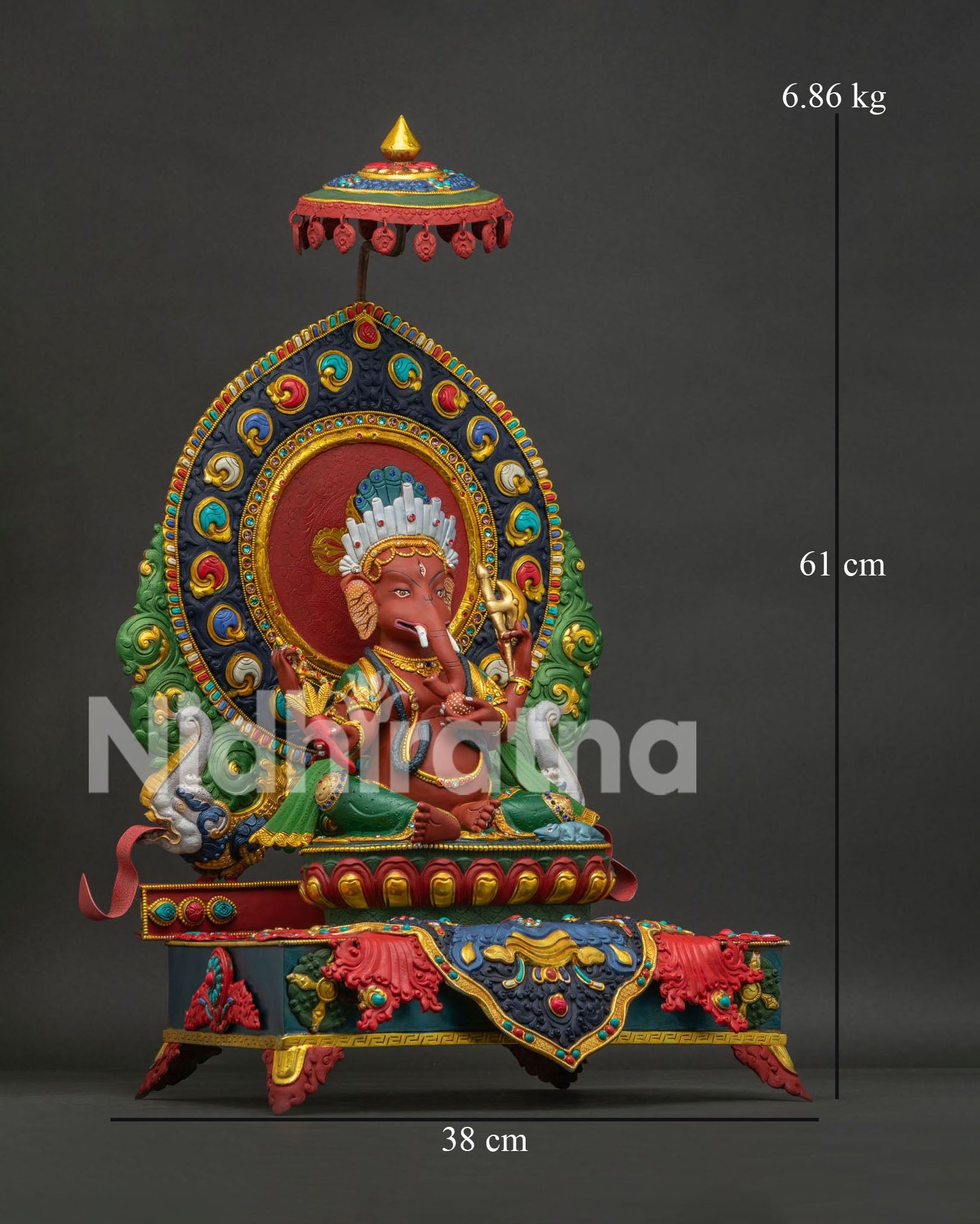 Right side view of handcrafted copper Ganesh statue with gold gilded decorations