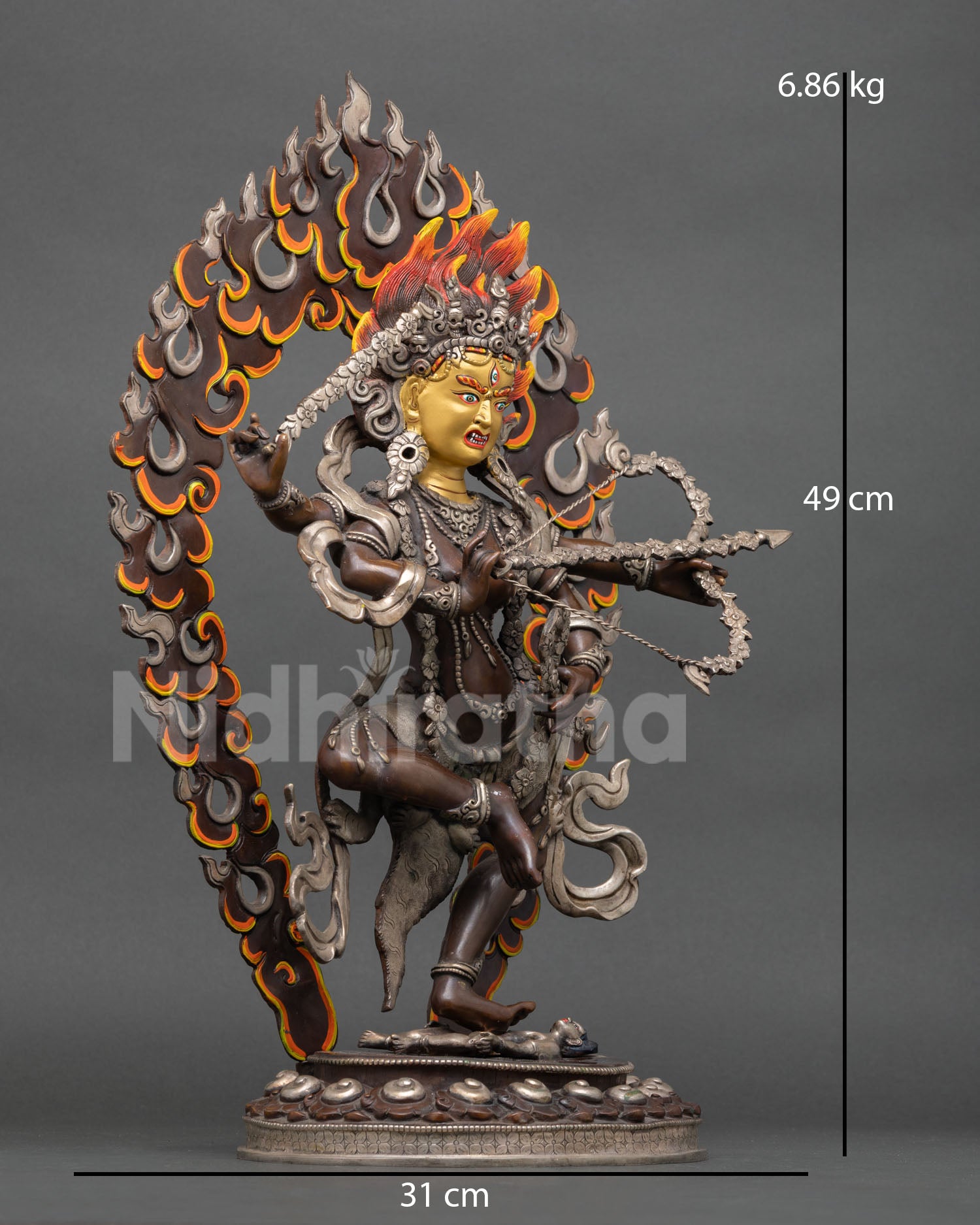 Right side view of Kurukulla statue, copper patina and ritual ornaments