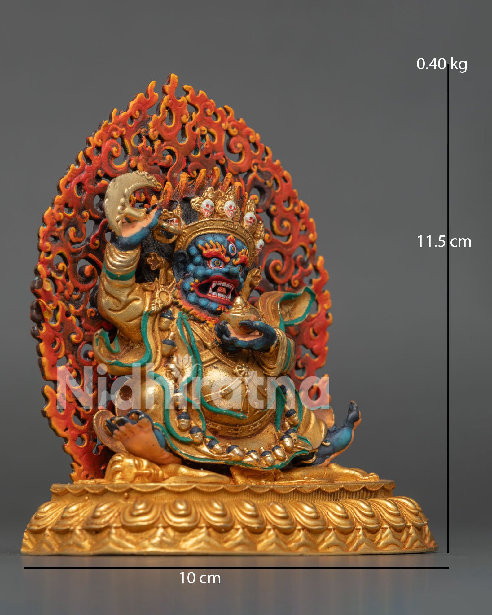 Right side view of Mahakala Bernagchen Statue on lotus seat, trampling figure, gold-gilded Himalayan Buddhist art