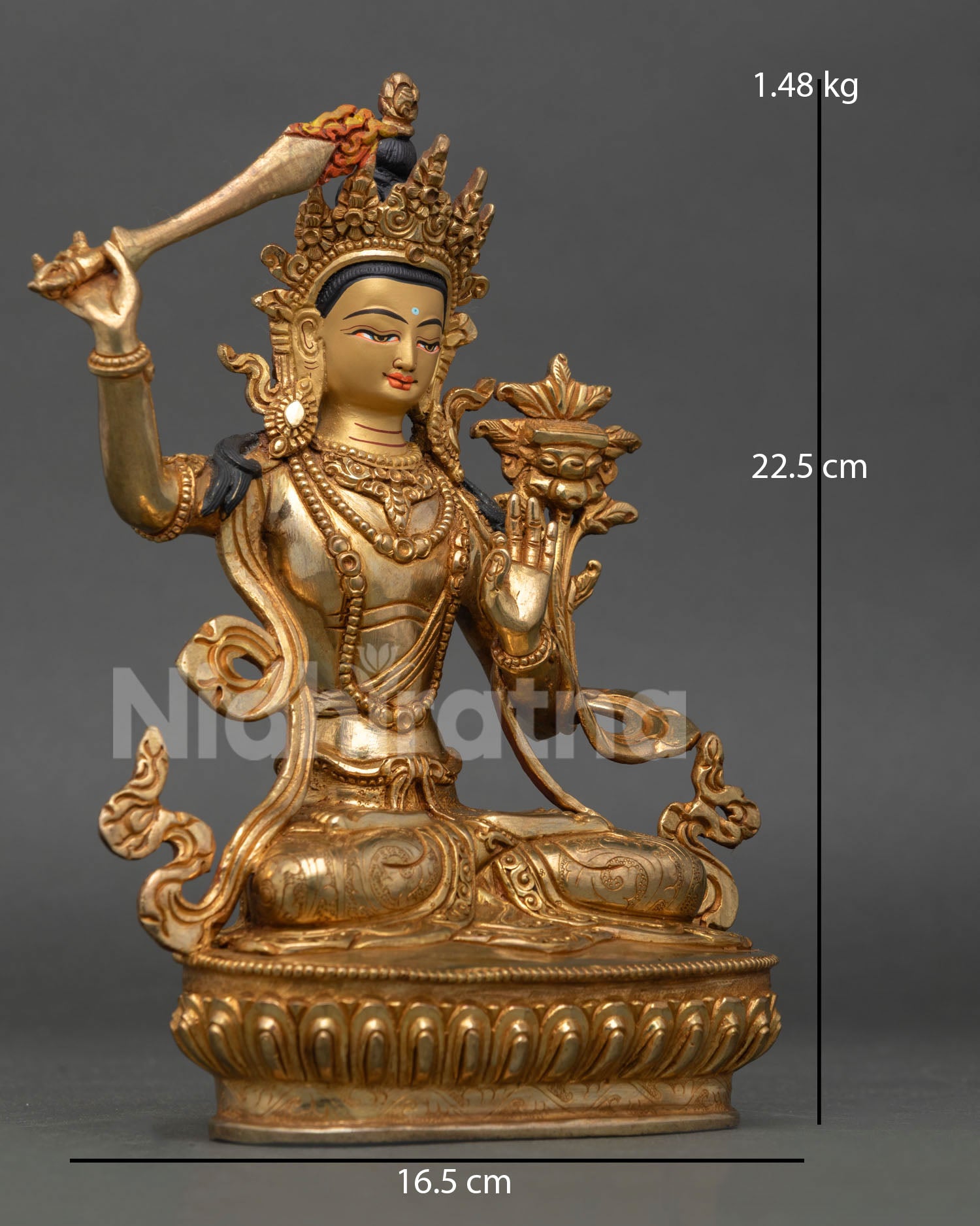 Right side view of Manjushri Bodhisattva sculpture, copper body with intricate hand carving