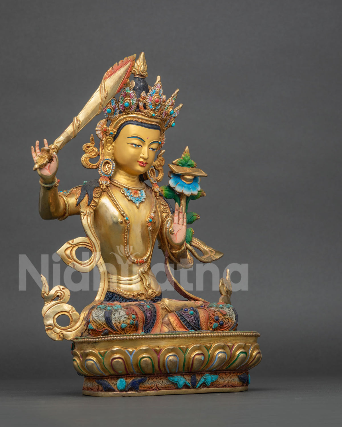 Right Side View of Manjushri Statue from Nepal Holding Wisdom Sword on Lotus Pedestal