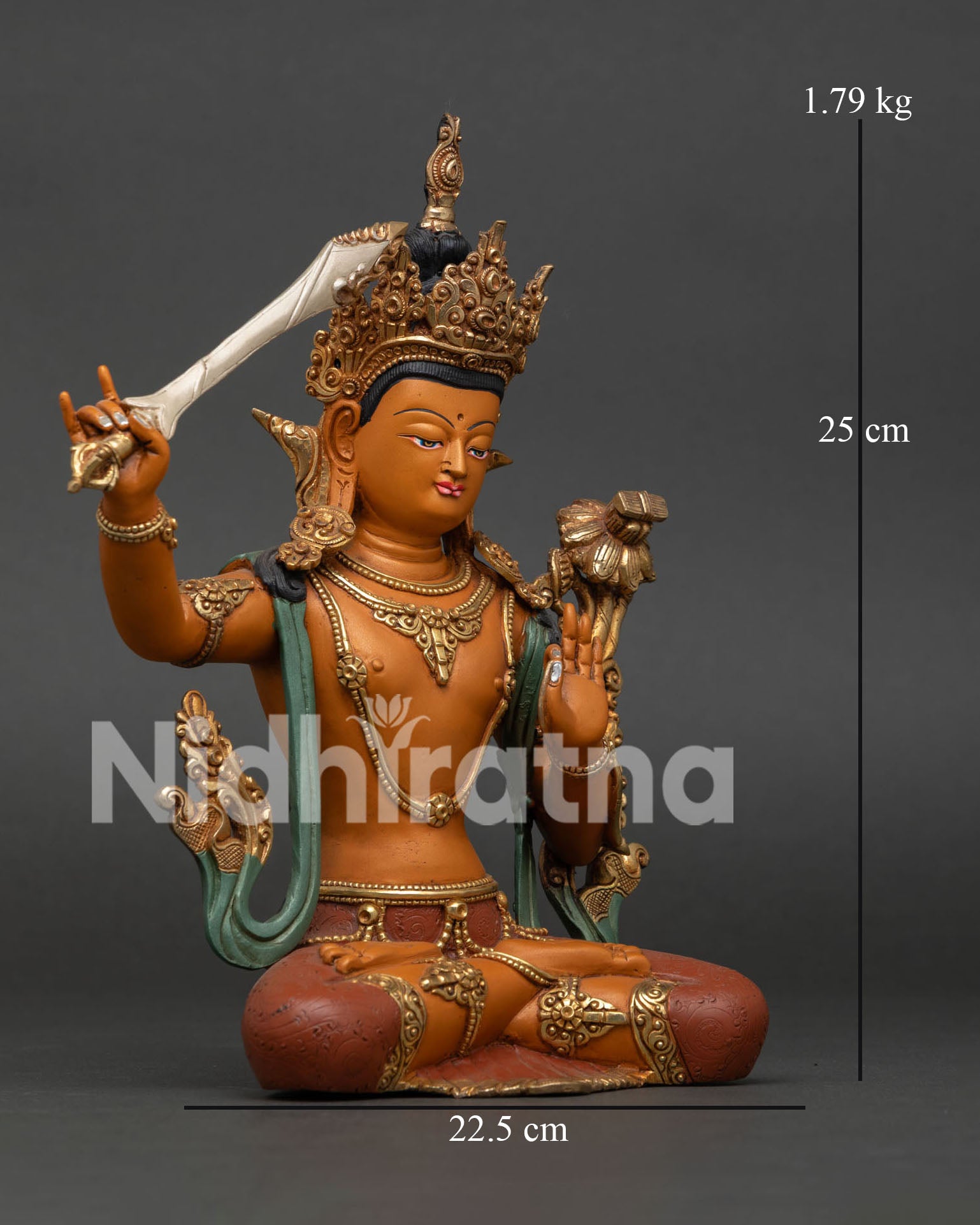 Right side view of Manjushri Statue with flaming sword raised, lotus seat detail