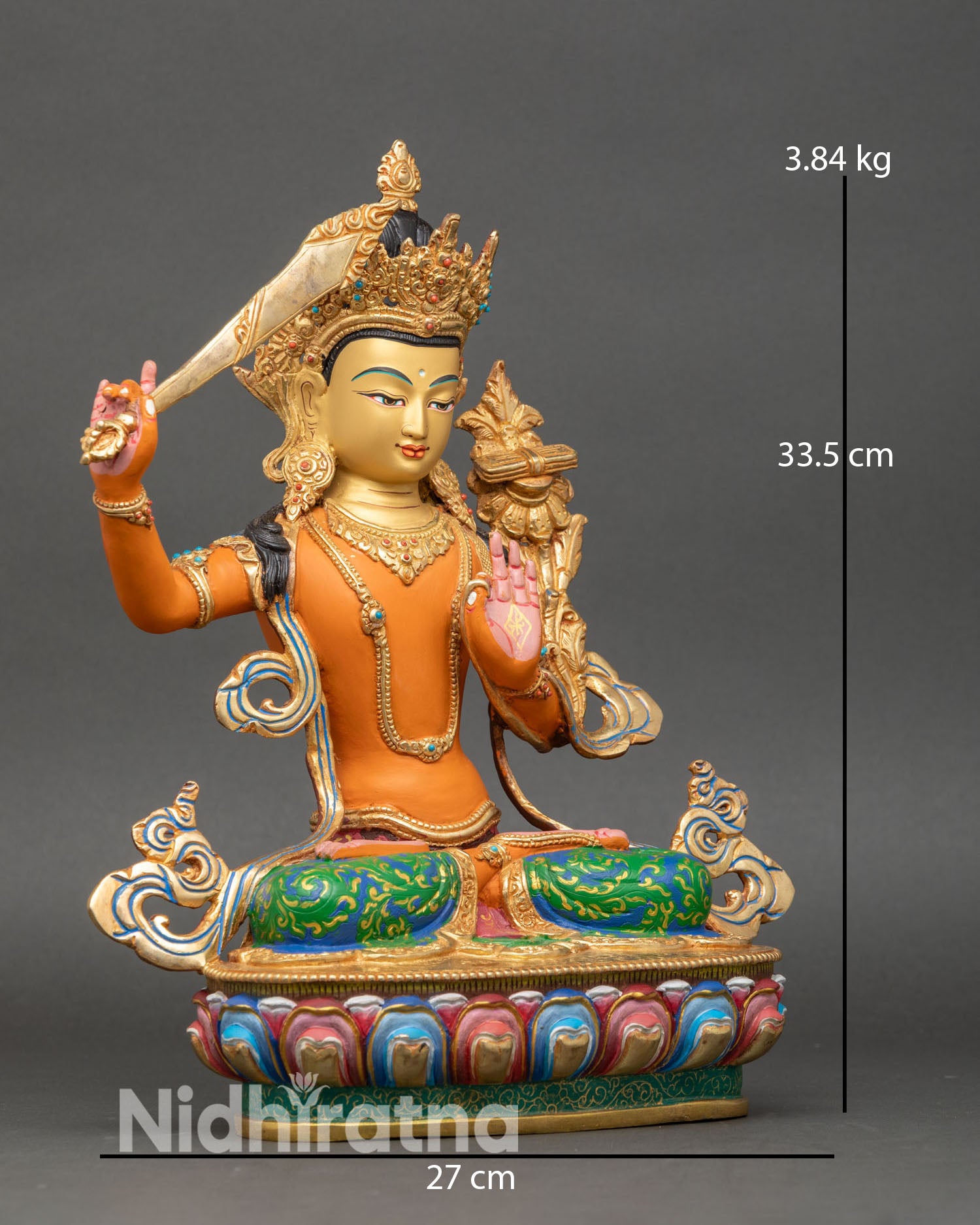 Right side view of Manjushri Statue with flaming wisdom sword and lotus pedestal