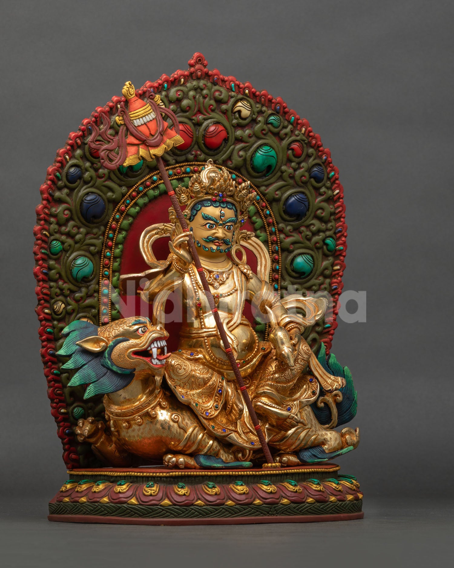 Right side view of Namtoshe Vaishravana statue Phnom Penh on snow lion throne, Nepal
