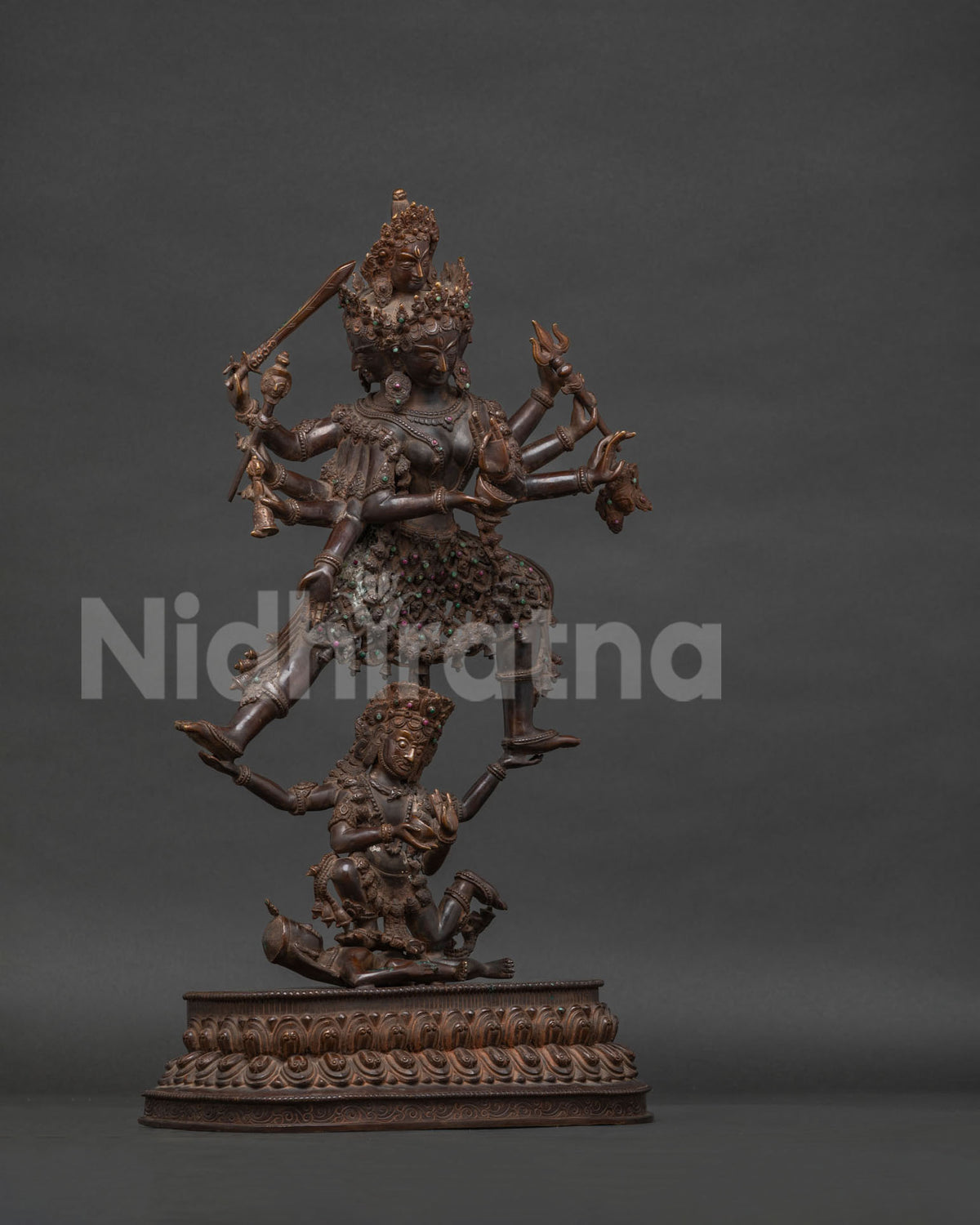 Right side view of oxidized copper Siddhi Lakshmi statue on lotus pedestal
