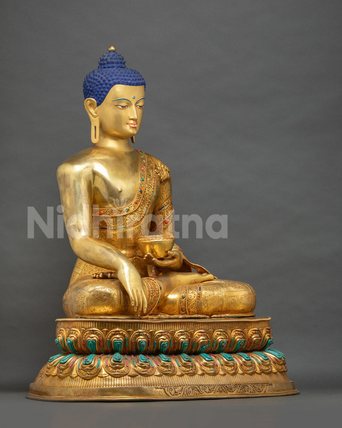 Right side view of Shakyamuni Buddha statue in Bhumisparsha Mudra on double lotus throne