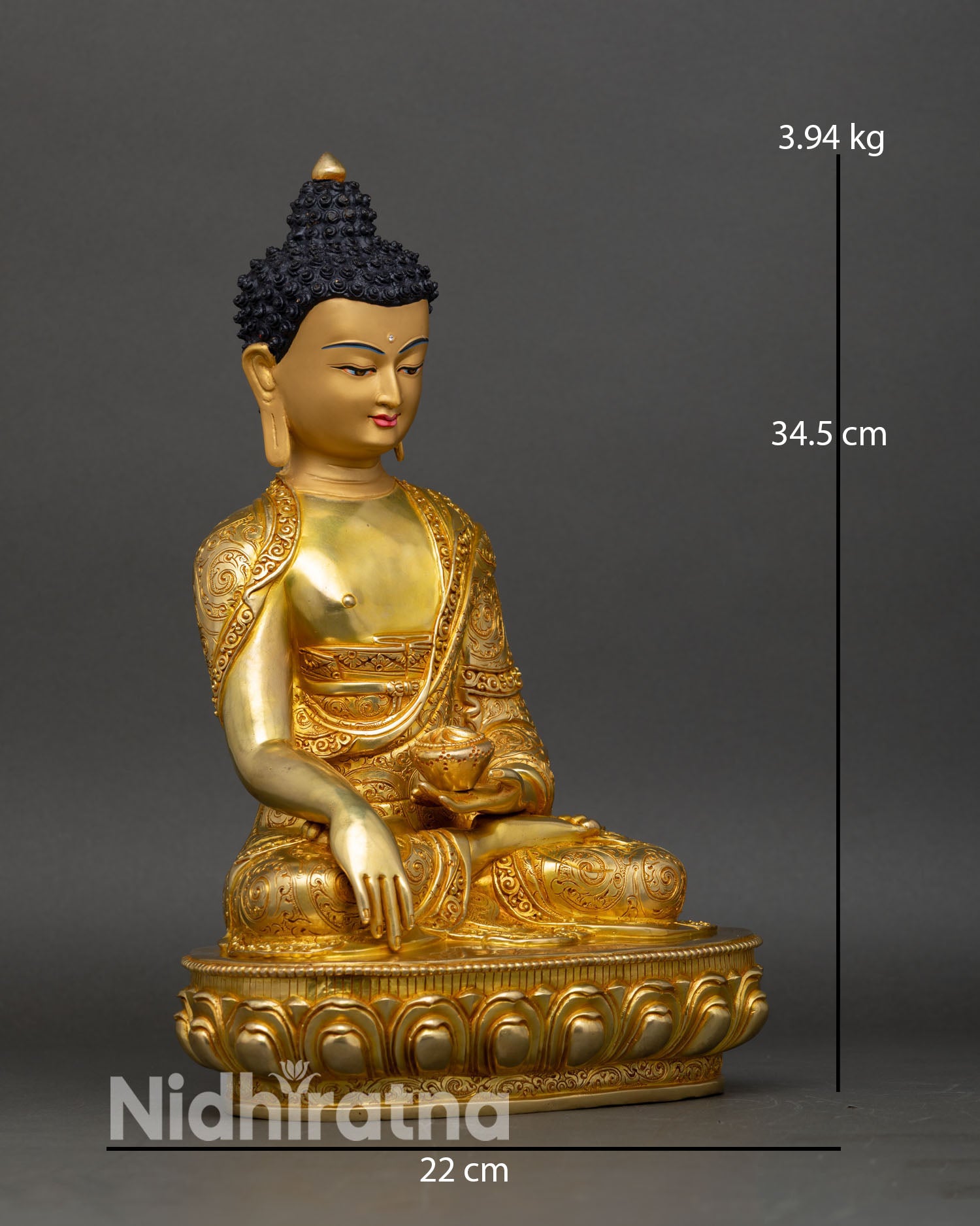 Right side view of Shakyamuni Buddha statue seated in earth-touching mudra on lotus