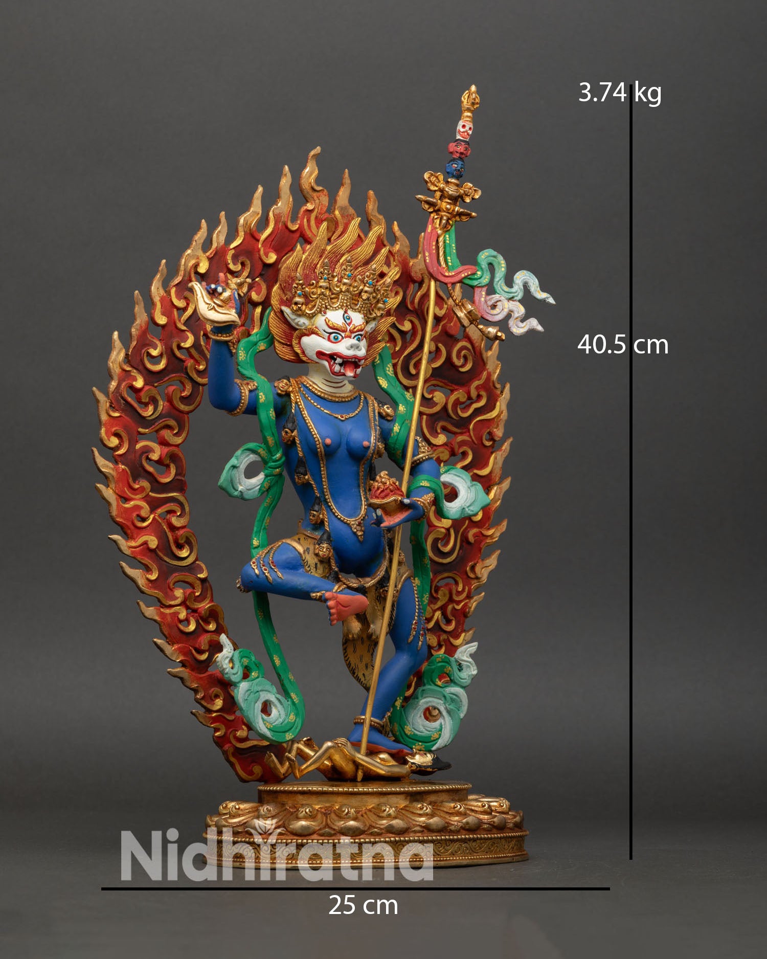 Right side view of Simhamukha Statue, standing on lotus and subduing human figure