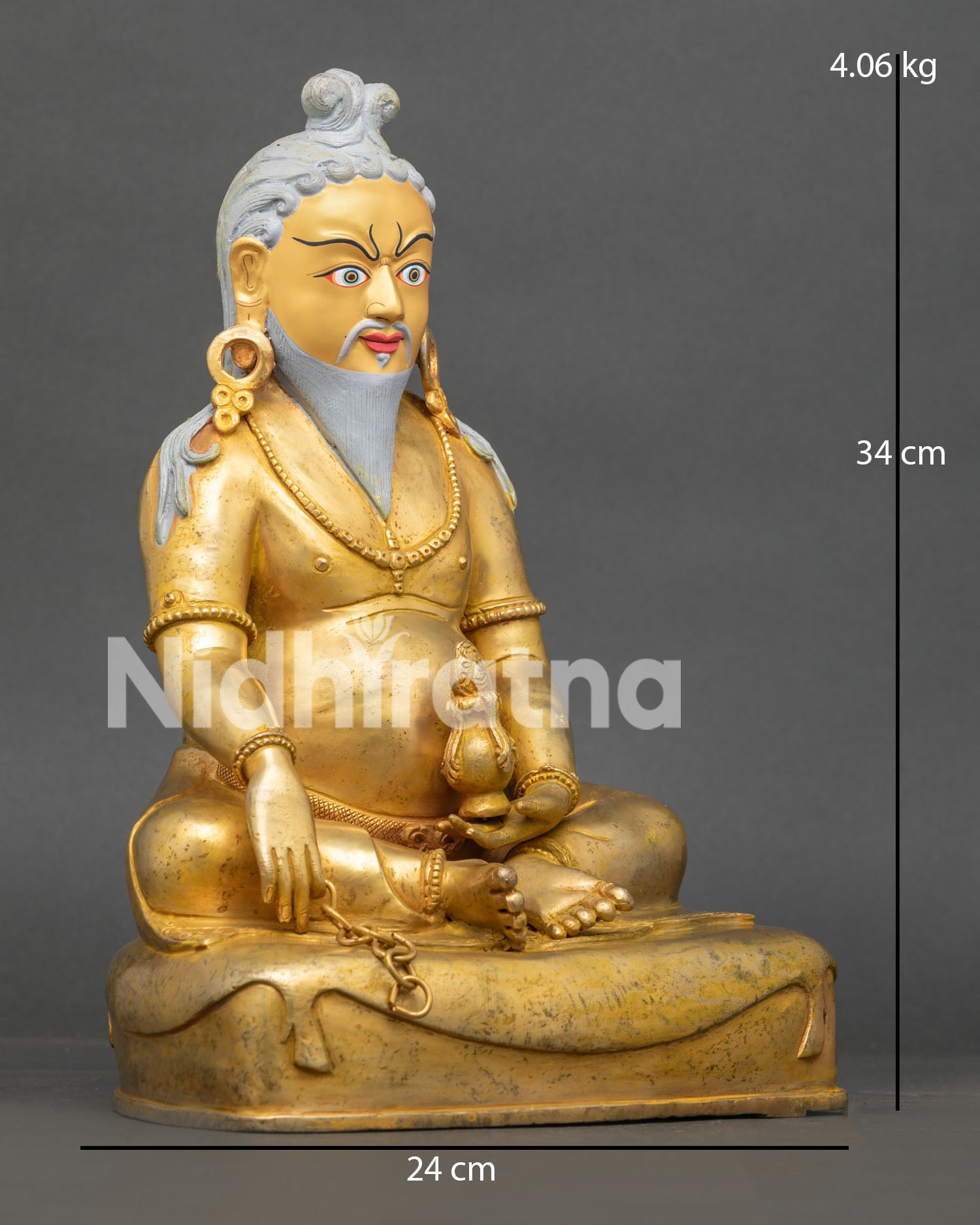 Right side view of Thang Thong Gyalpo Statue with ritual vase and striped deer-skin seat