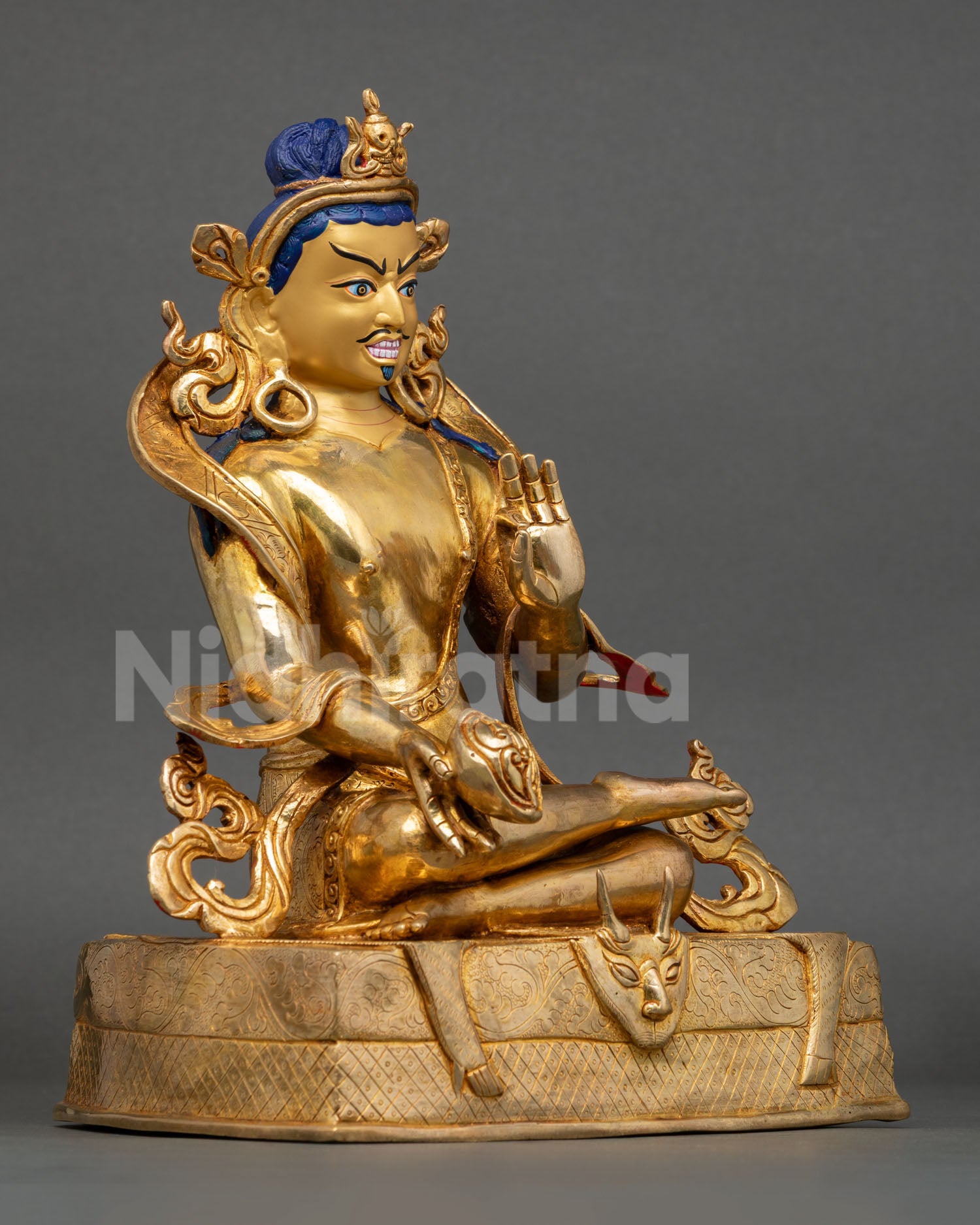 right side view of tilopa statue with skull cup and traditional himalayan craftsmanship