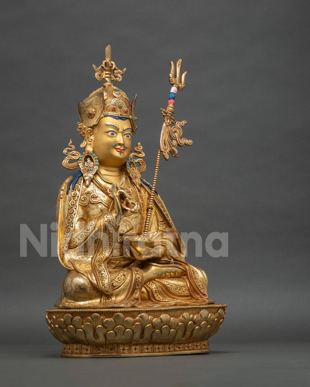 Right side view of Tsokye Dorje statue holding vajra and skull cup, 24K gold fire-gilded copper figure