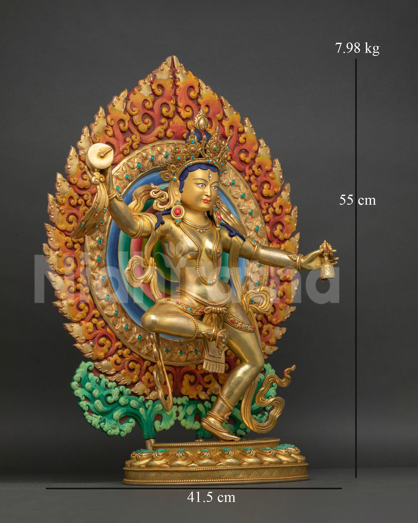 right view side, right profile view of machig labdron dancing statue with drum, lotus throne, coral and turquoise decorated