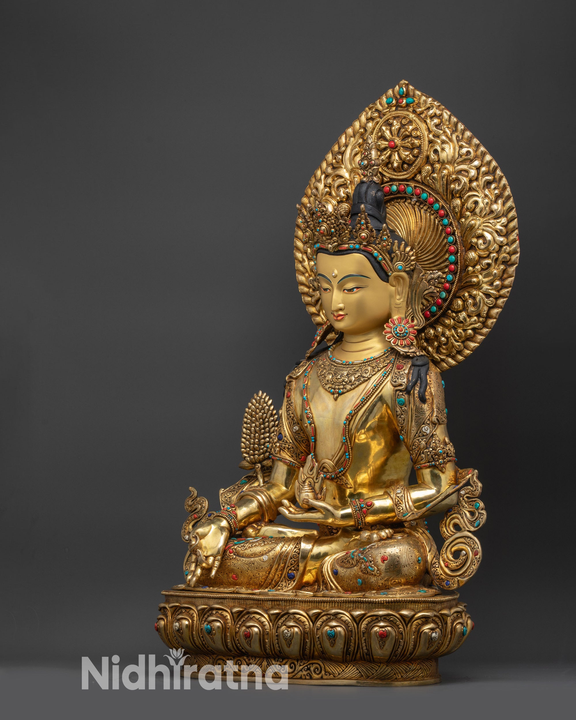 right side view earthly realm protector Kshitigarbha holding chintamani treasure