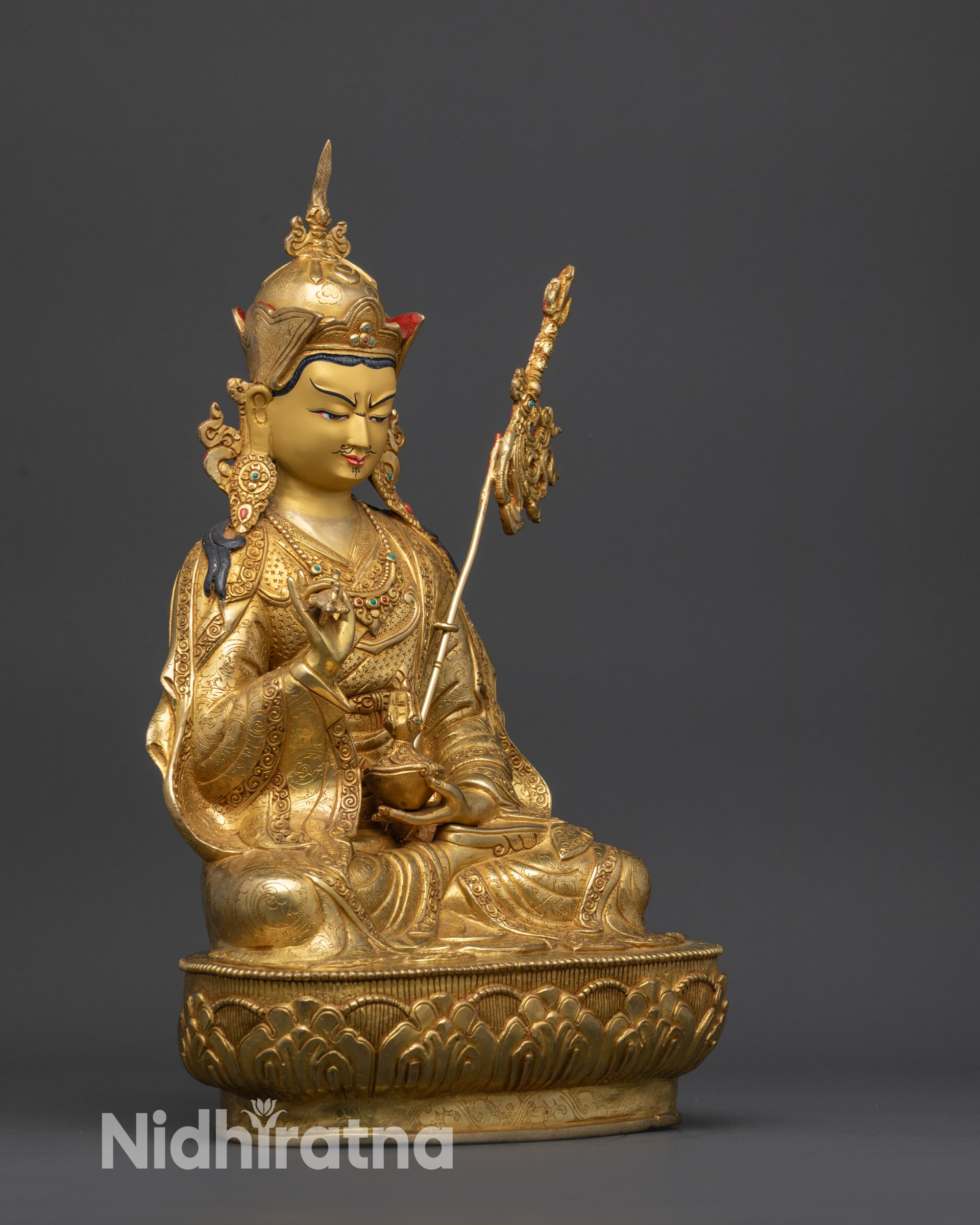 right view side Tsokye Dorje statue with vajra, skull cup, and carved lotus pedestal