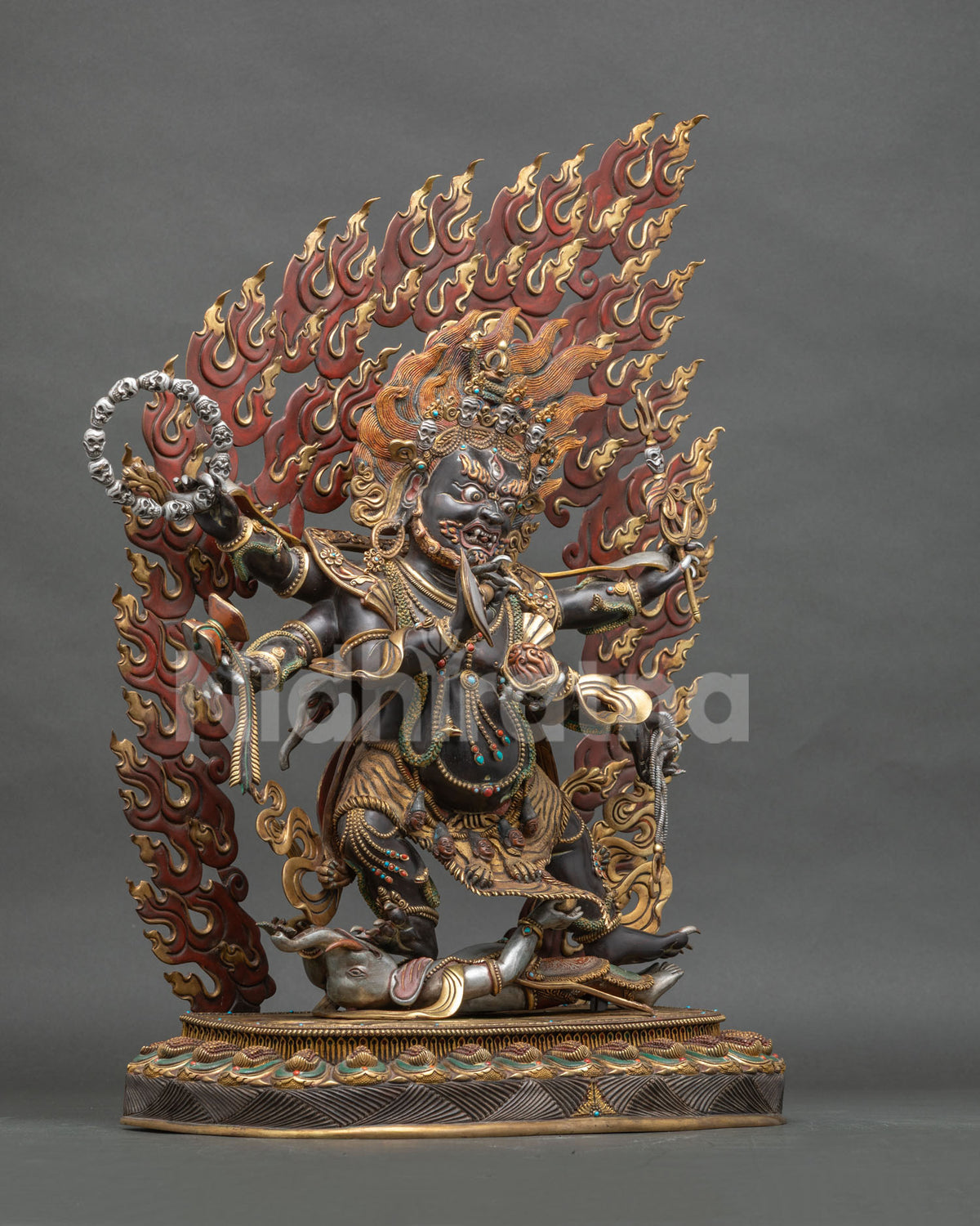 Shadbhuja Mahakala Statue right side view with skull rosary, trident and gold-gilded robes