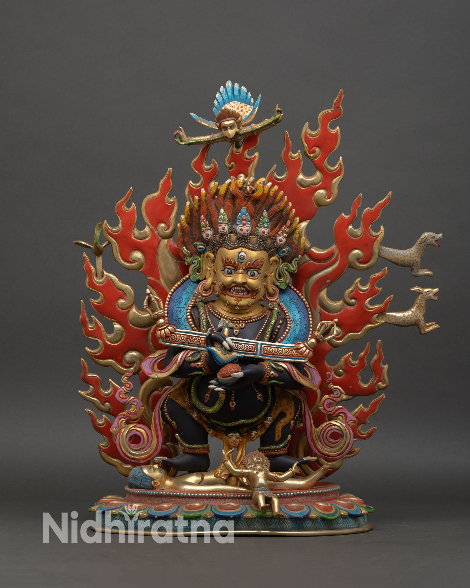 Shakya Mahakala statue front view wrathful Vajrayana protector sculpture handcrafted in copper with 24K gold gilded face from Patan Nepal.