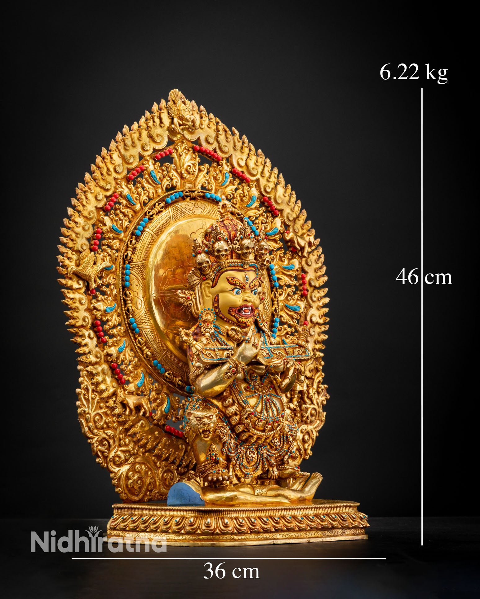 Shakya Mahakala statue left side view dynamic posture copper wrathful deity serpent garland Vajrayana protector sculpture Nepal
