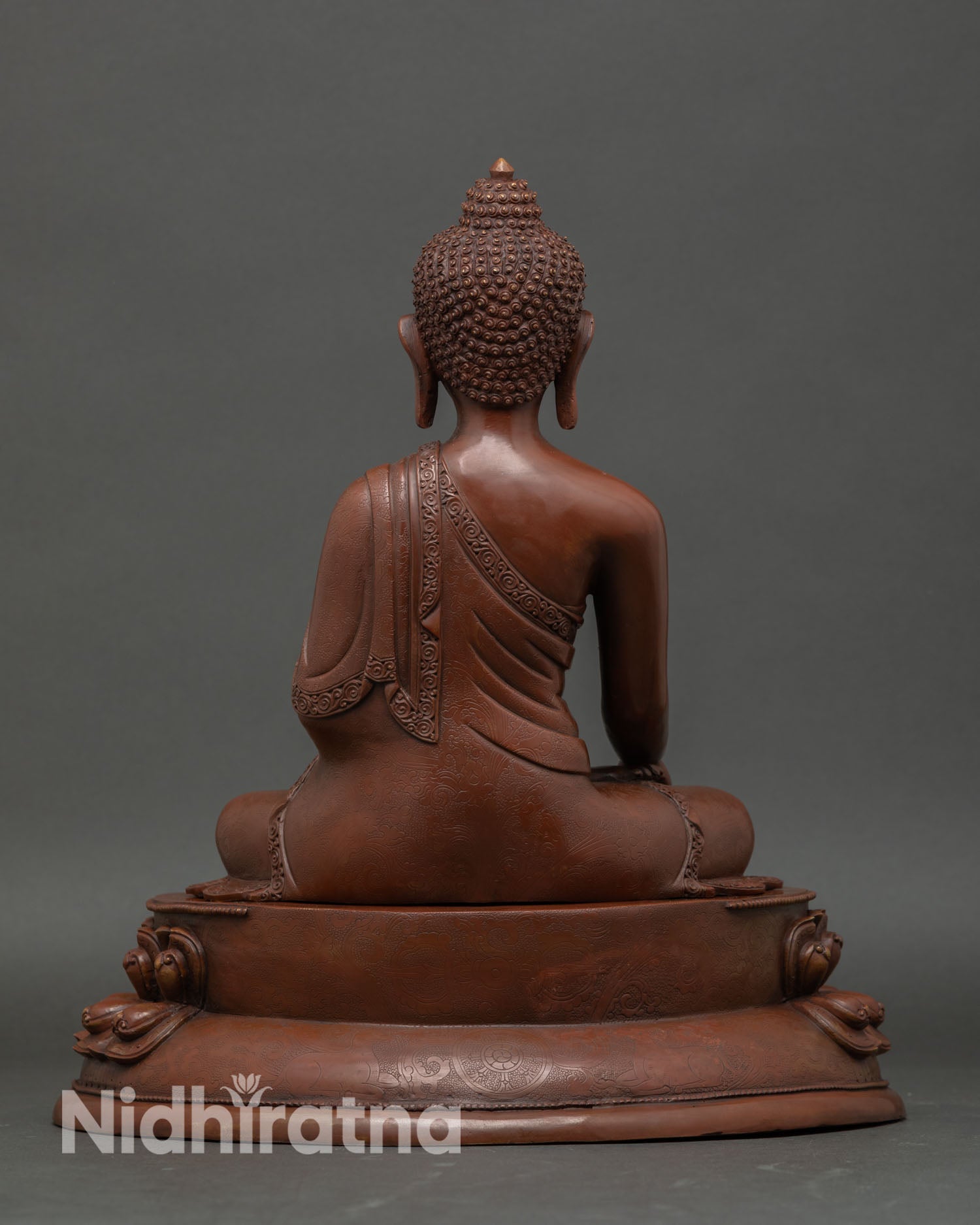 Shakyamuni Buddha back view seated on lotus throne meditation altar statue handmade Newari copper sculpture for spiritual decor and prayer space.