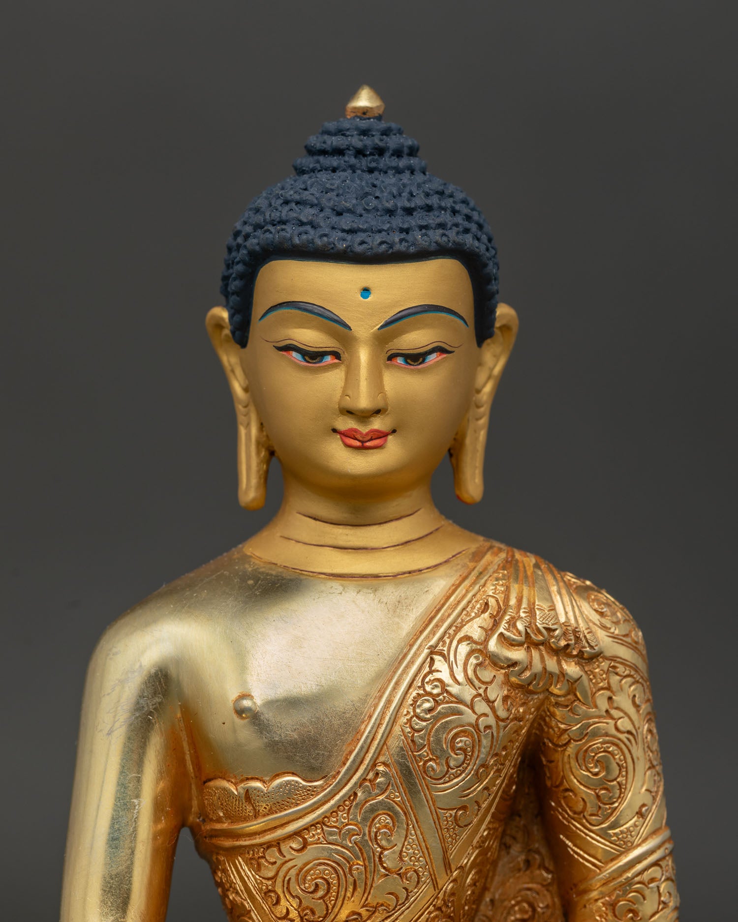 Shakyamuni Buddha Gold Painted Face with Handcarved Floral Robe Close Up.