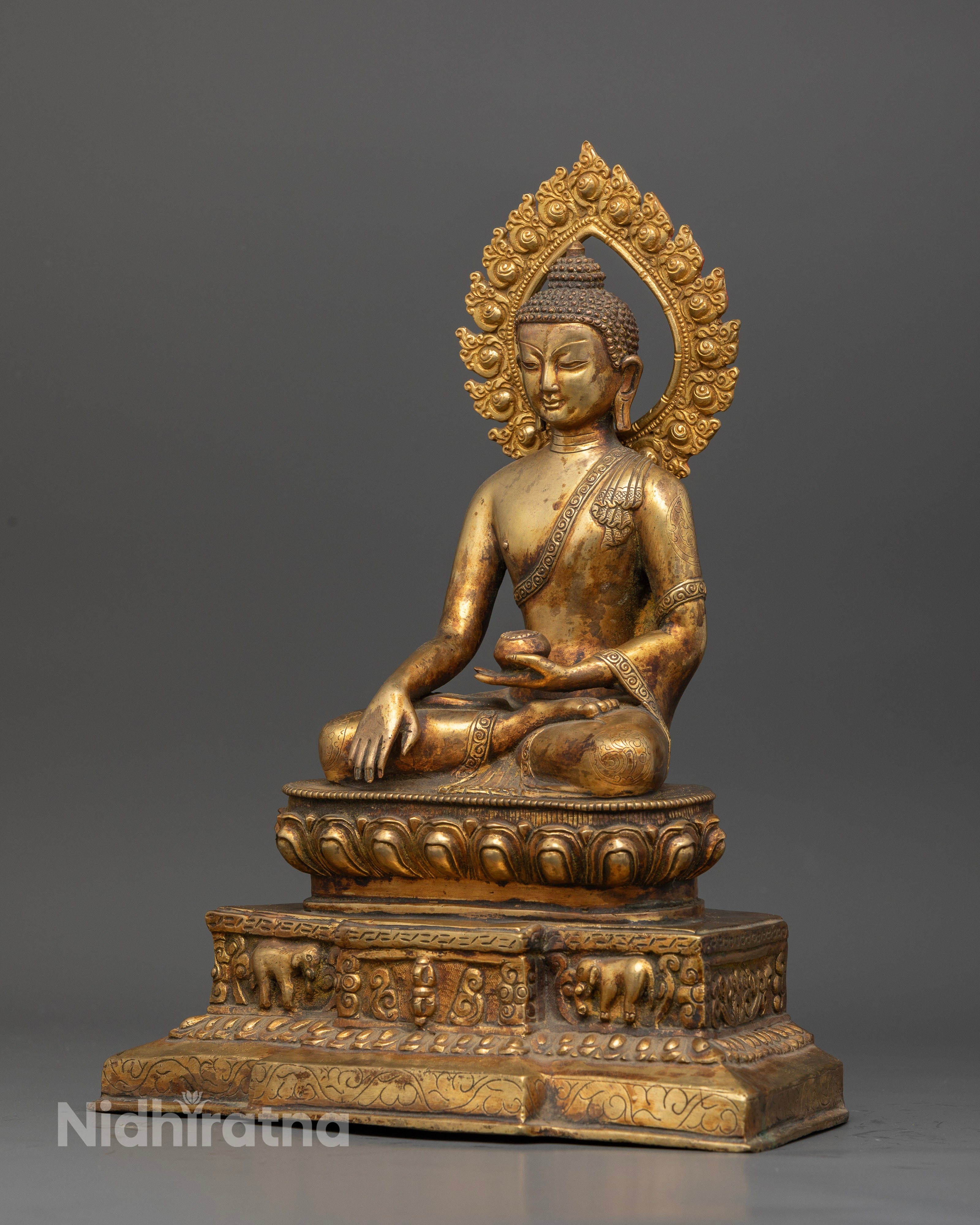Shakyamuni Buddha in Bhumisparsha Mudra with sacred begging bowl.