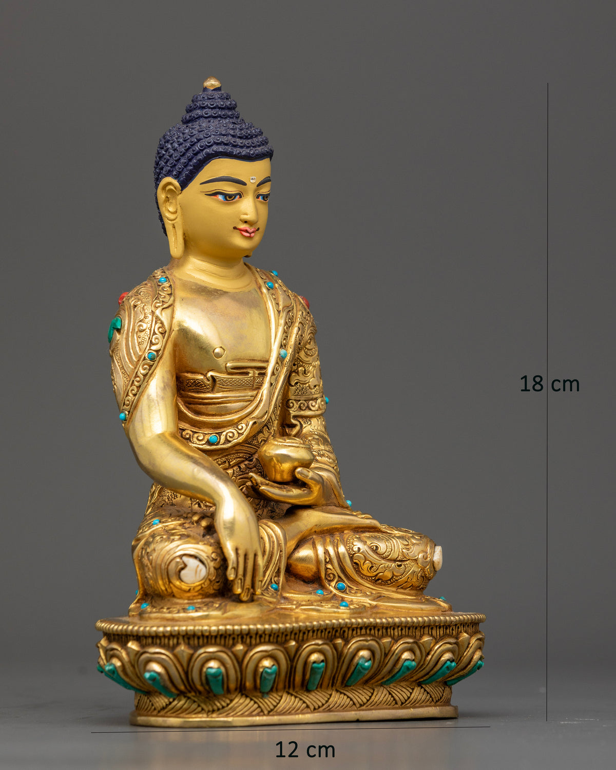 Shakyamuni Buddha seated on a lotus pedestal in Earth Touching Mudra holding a sacred Patra alms bowl