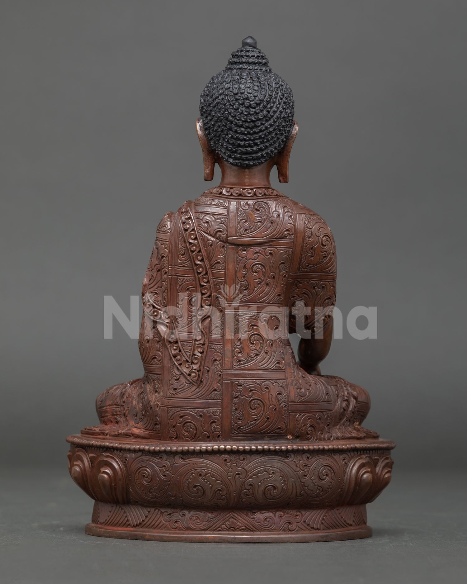 Shakyamuni Buddha seated on a lotus throne in earth touching mudra, spiritual altar statue from Nepal handmade for Buddhist decor and meditation space.