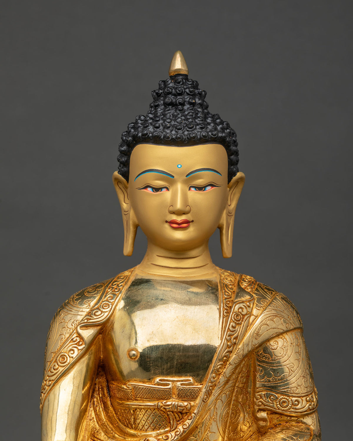 Shakyamuni Buddha statue 24K gold painted face.