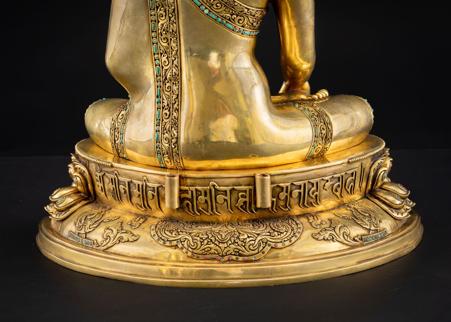 Shakyamuni Buddha statue base engraved with Tibetan mantra Om Muni Muni Mahamuni Shakyamuni Svaha