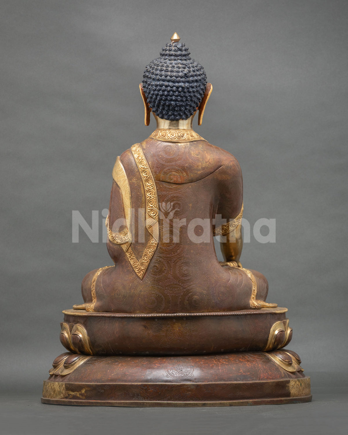 Shakyamuni Buddha statue with chemically oxidized copper patina and traditional Nepalese art.