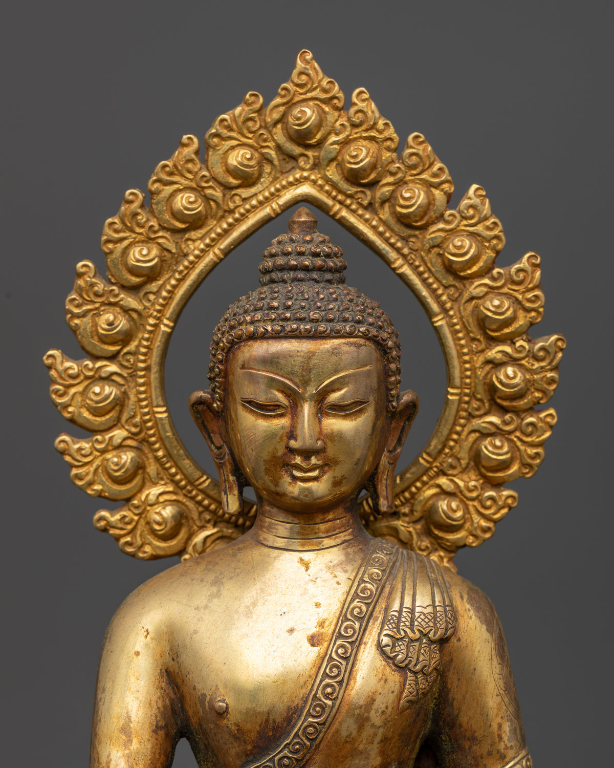 Shakyamuni Buddha Statue Close Up Bhumisparsha Mudra Antique Gold Finish.